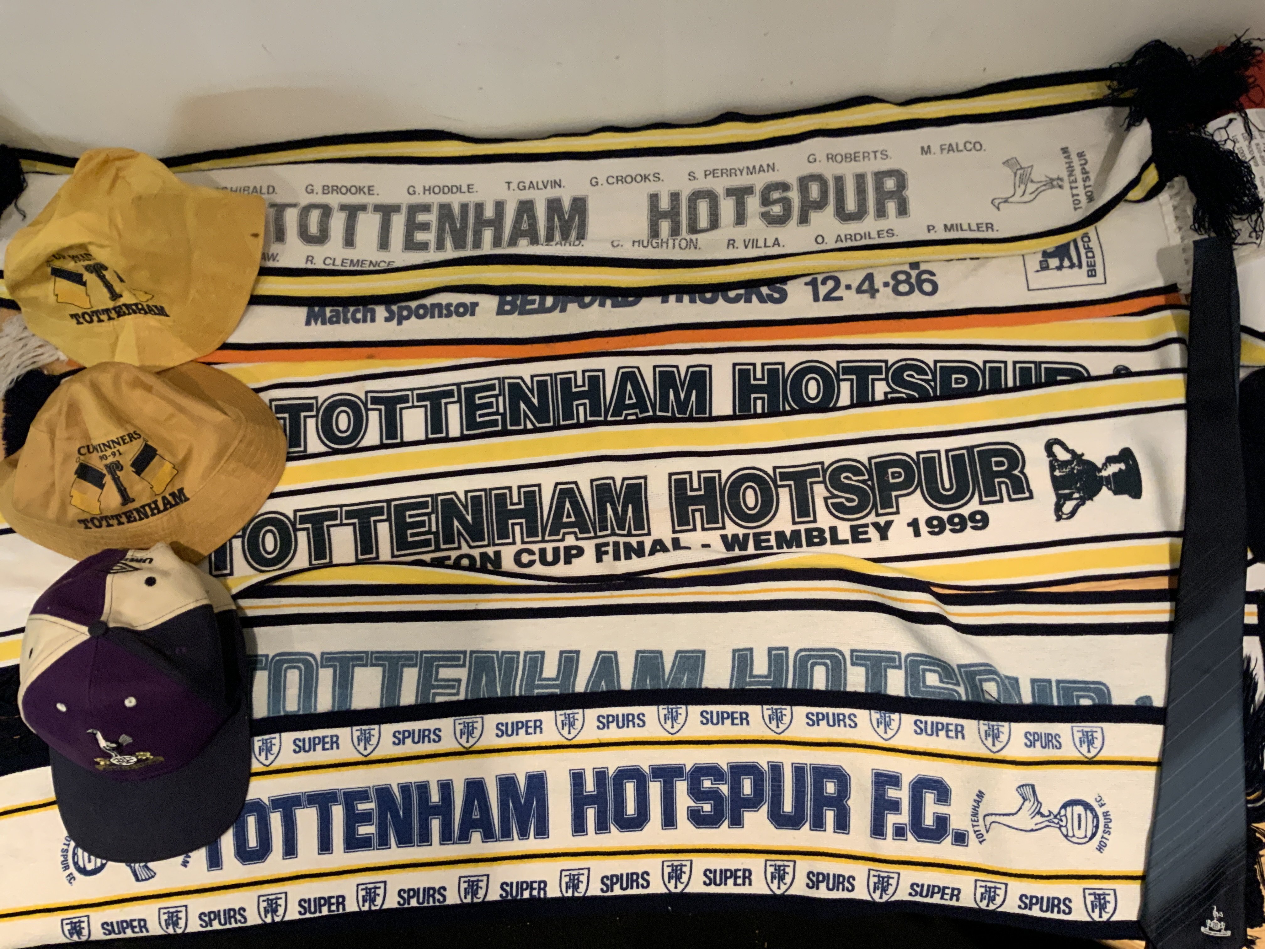 Tottenham Football Scarf + Hat Collection: Includes 2 x 1999 Worthington Cup Final, Early 1980s FA Cup Final scarves and 2 x 1991 hats plus more. (10)