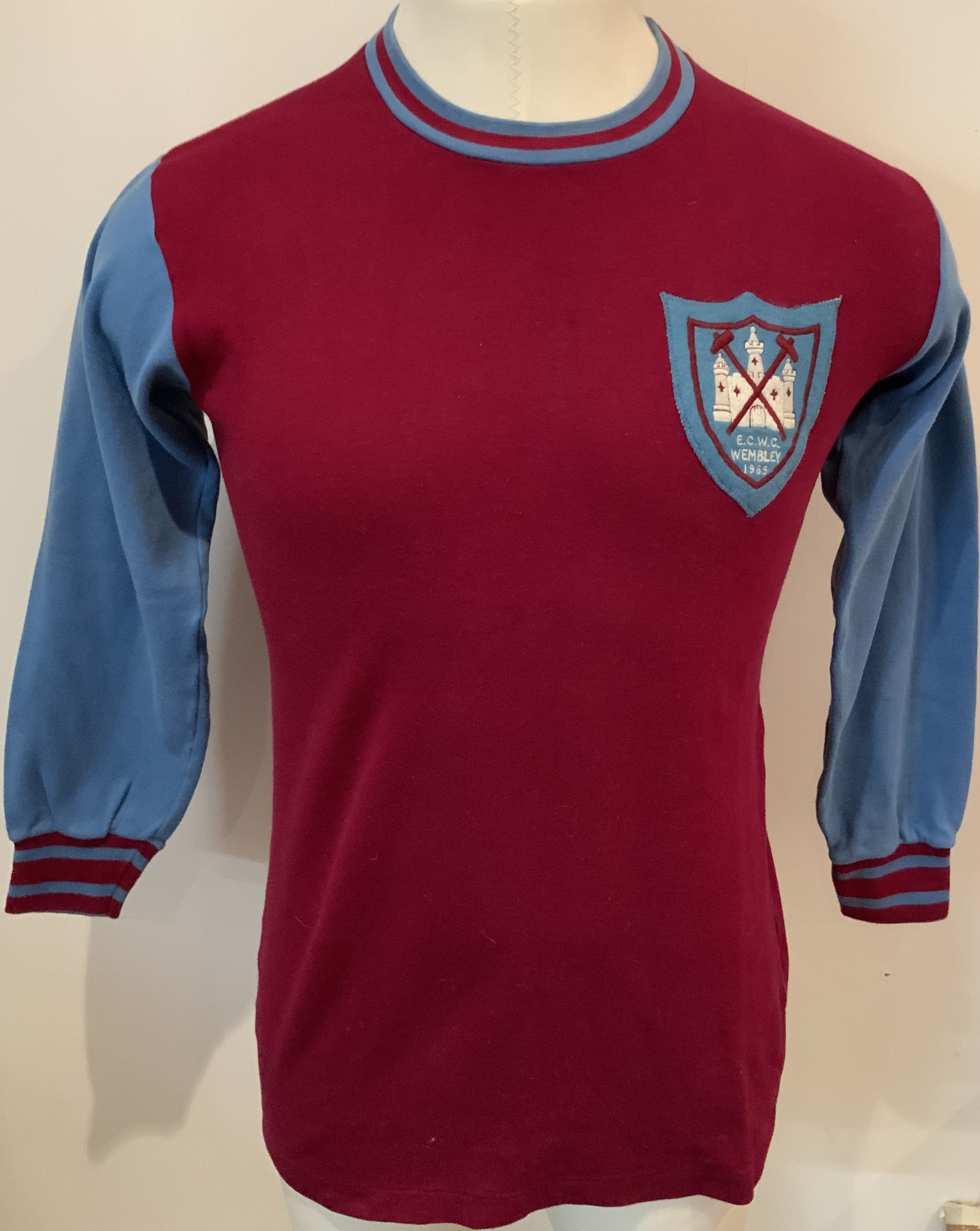 Ron Boyce West Ham Match Worn 1965 European Cup Winners Cup Final Shirt: Bukta shirt in excellent condition worn in the final V TSV Munich. Ron Boyce registered an assist when setting up the opening goal scored by Alan Sealey. A unique opportunity to obtain an iconic piece of West Ham history from their first European triumph. COA will be supplied by the family of Boyce.