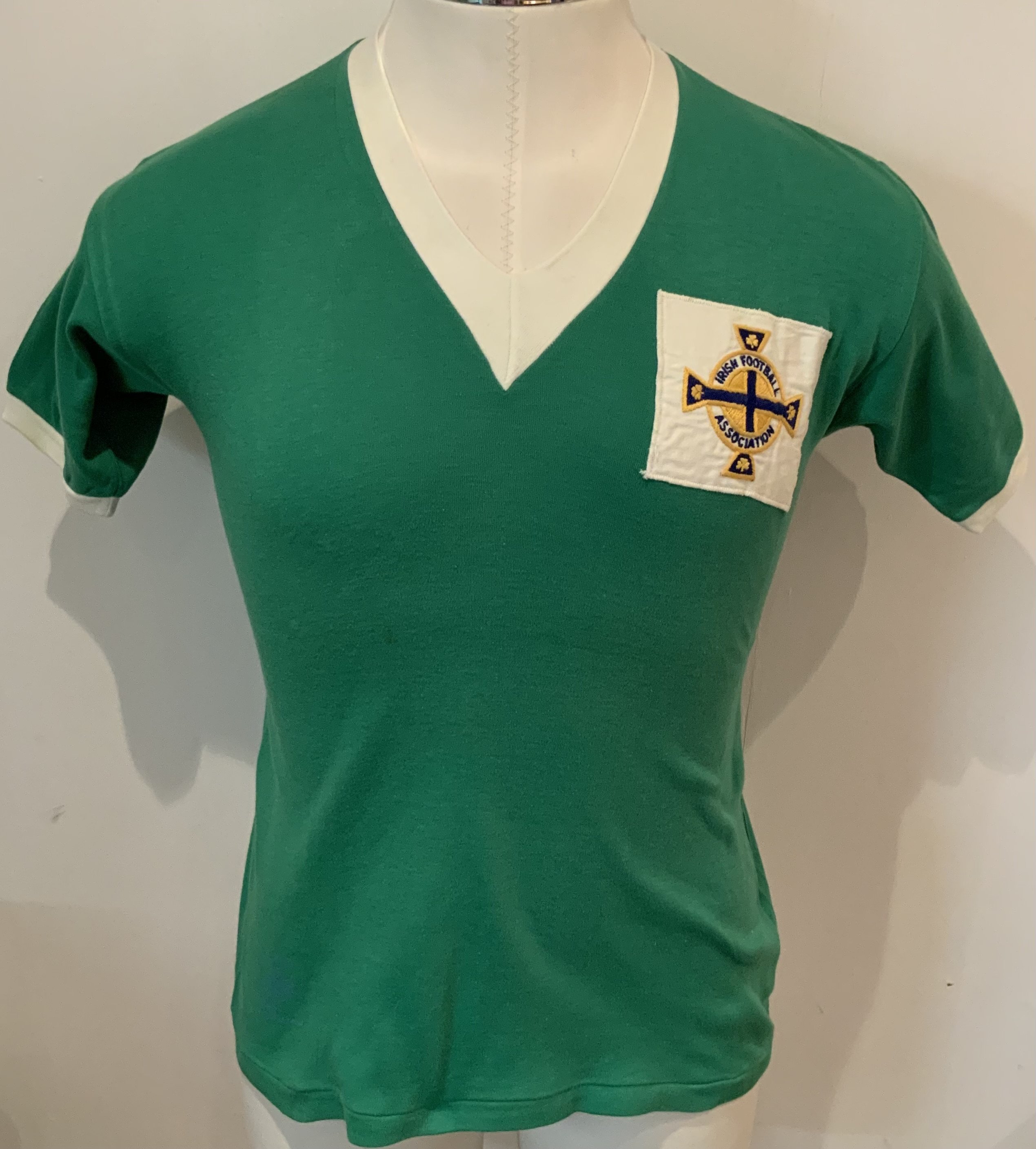 Northern Ireland Schools Match Worn Football Shirt: Green number 10 Umbro shirt was worn by K Wilson of Larne after the Victory Shield match at Vicarage Road on 5 April 1957 which England won 3-0. Excellent condition shirt swapped with Ron Boyce of West Ham.