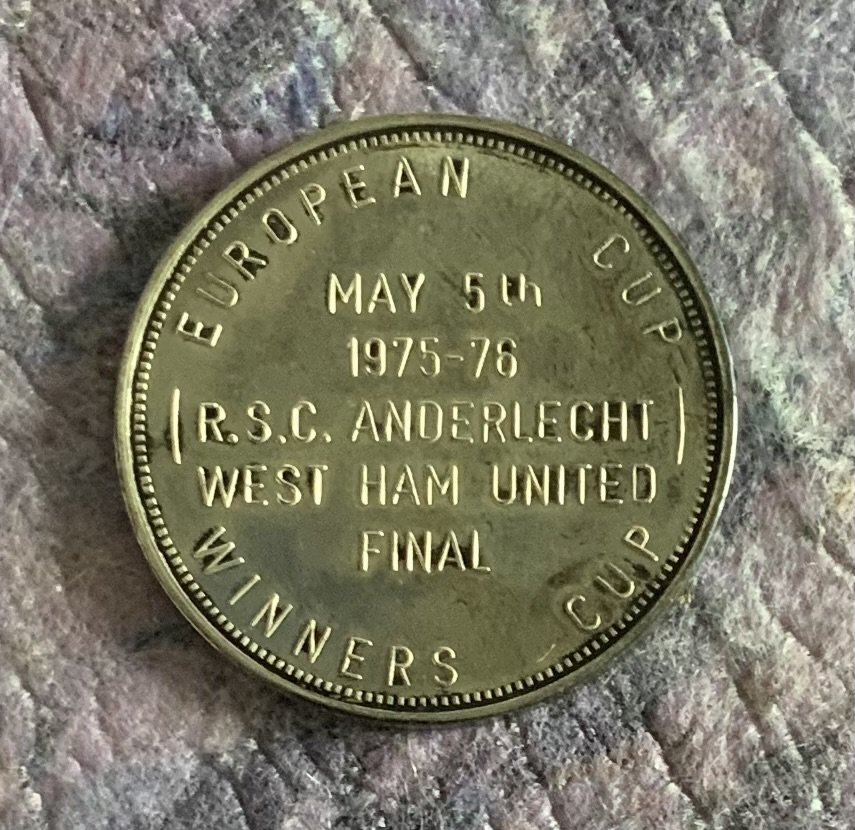 Ron Boyce West Ham 1976 European Cup Winners Cup Gifted Medal: Awarded by Anderlecht to Boyce. Medal has Anderlecht 1975 1976 to one side and is engraved with match details to the other. Rare one and a half inch medal in good condition given by Anderlecht to West Ham players and staff.