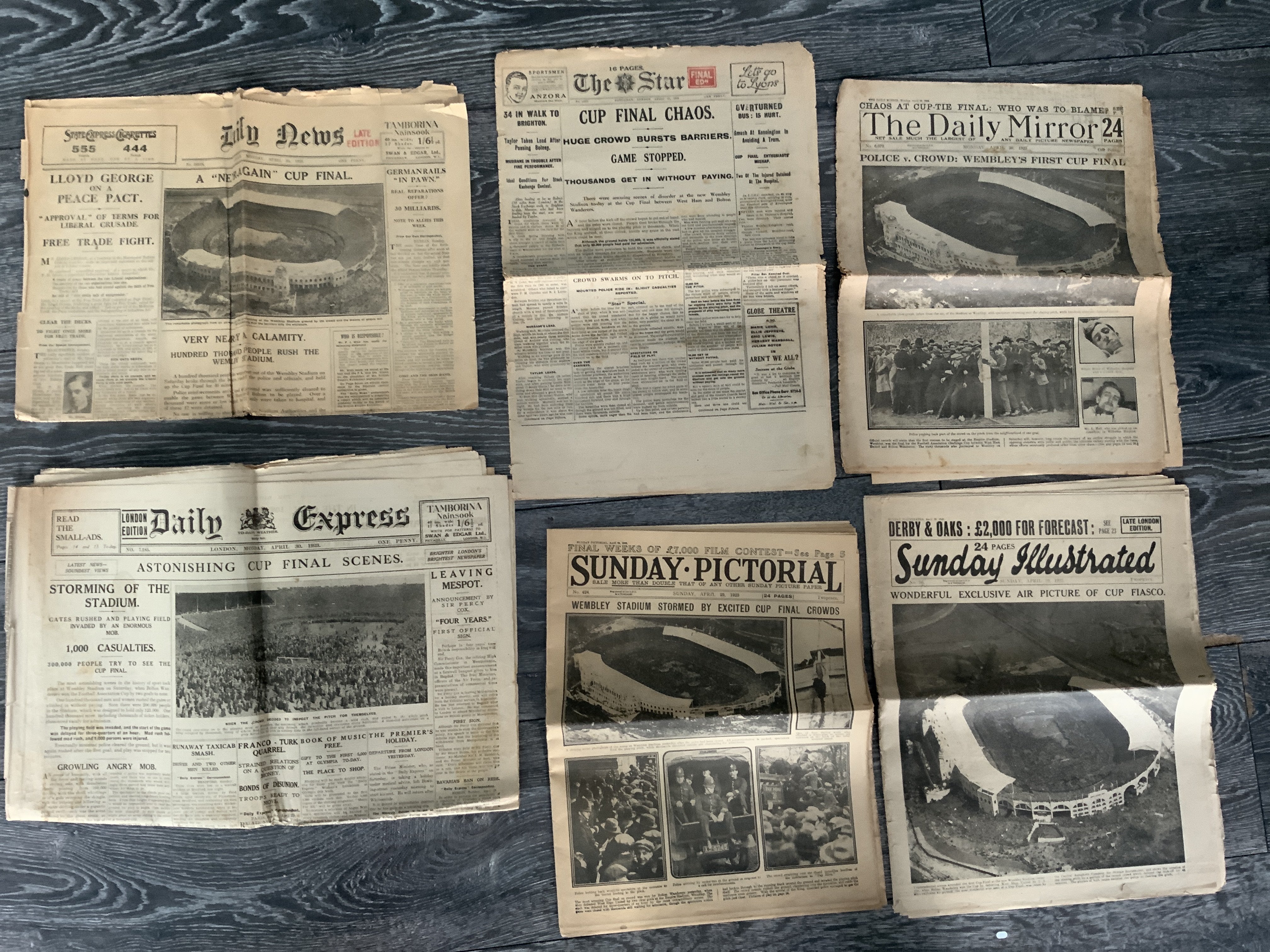 1923 FA Cup Final Football Newspapers: First match at Wembley Bolton v West Ham. Full newspapers from the Sunday Illustrated, Daily Mirror, Sunday Pictorial, Daily Express and The Star. C/W outer page of the Daily News. Mostly good with front page coverage and more of the famous event. (6)