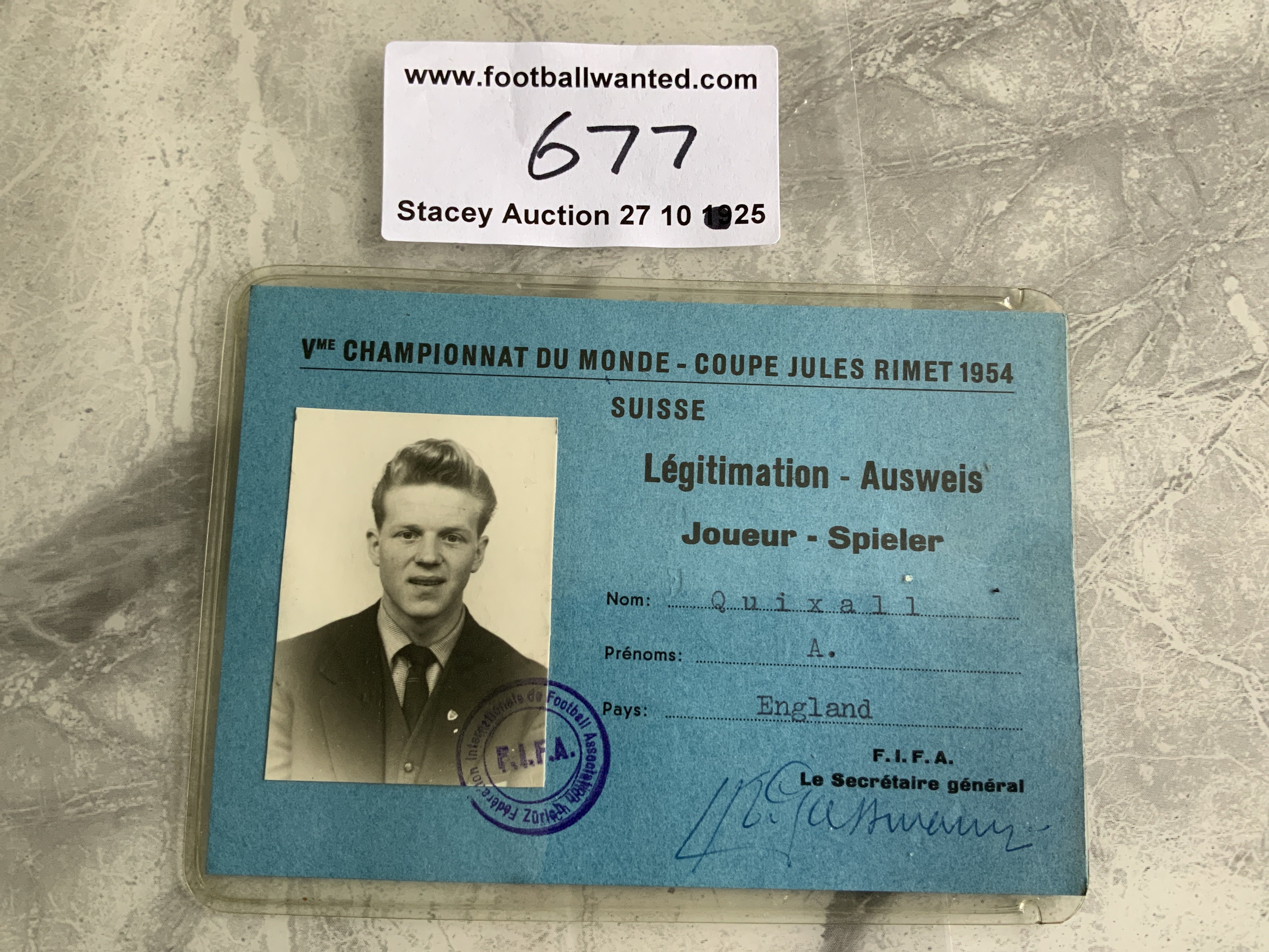 England Football Players 1954 World Cup Pass: Very rare photo identification for Albert Quixall the Sheffield Wednesday and Manchester United Busby Babes replacement in 1958. Direct from the family this large photographic I.D. Is stamped by FIFA with his name and team plus the words Championnat Du Monde Jules Rimet 1954.