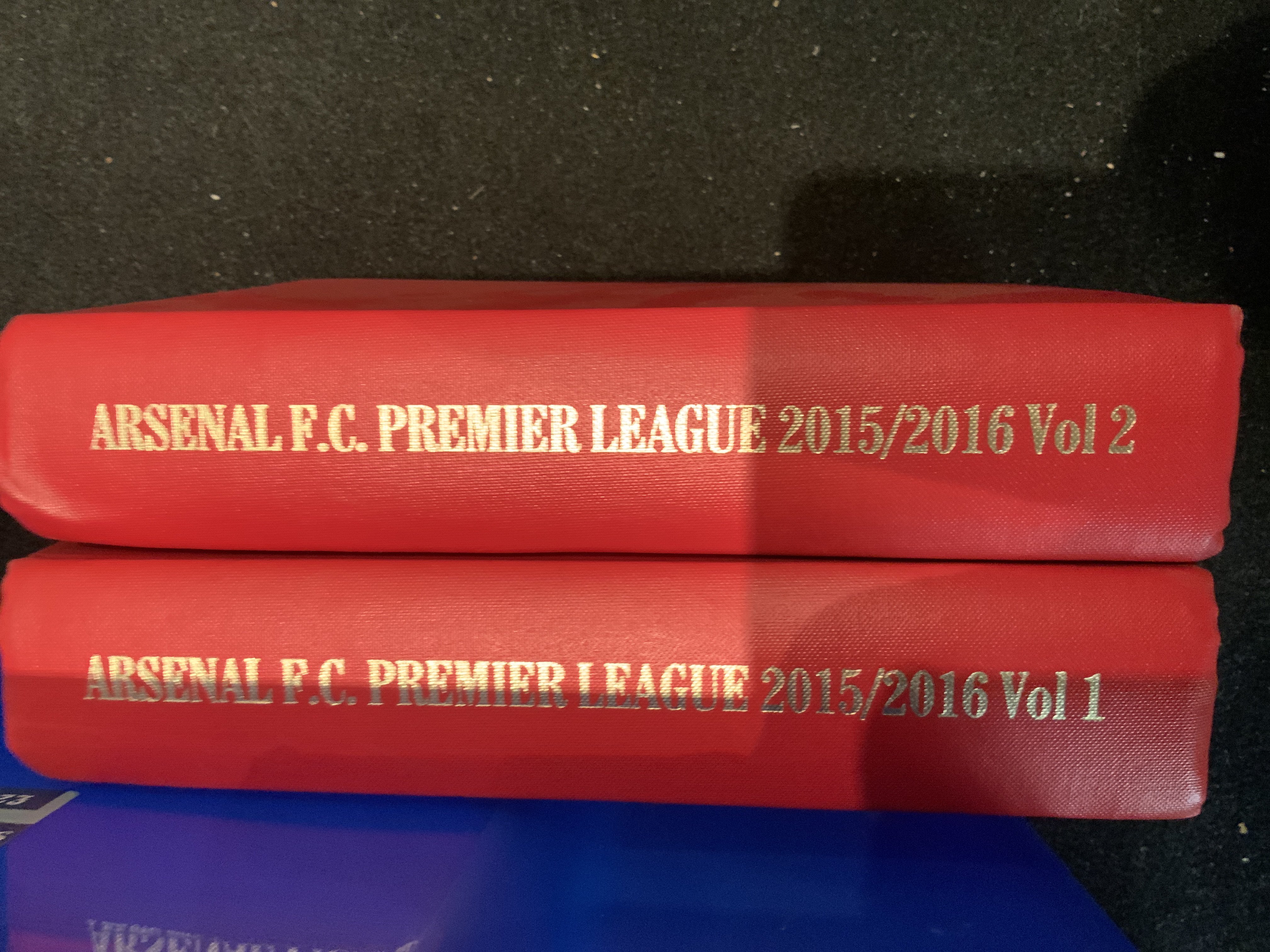 Football Memorabilia Box: Two bound volumes of home programmes for Arsenal 2015/16, approximately 50 pennants of various sizes, signed framed photos of Tottenham players Anderton and Berbatov, non sport press ohotos from the Plymouth area, tickets include 1998 World Cup England v Tunisia, 1981 FA Cup Final replay, Golf programmes, Man Utd photos, large flags for Arsenal finals in 1995 ECWC, 2000 UEFA Cup and a few cards.