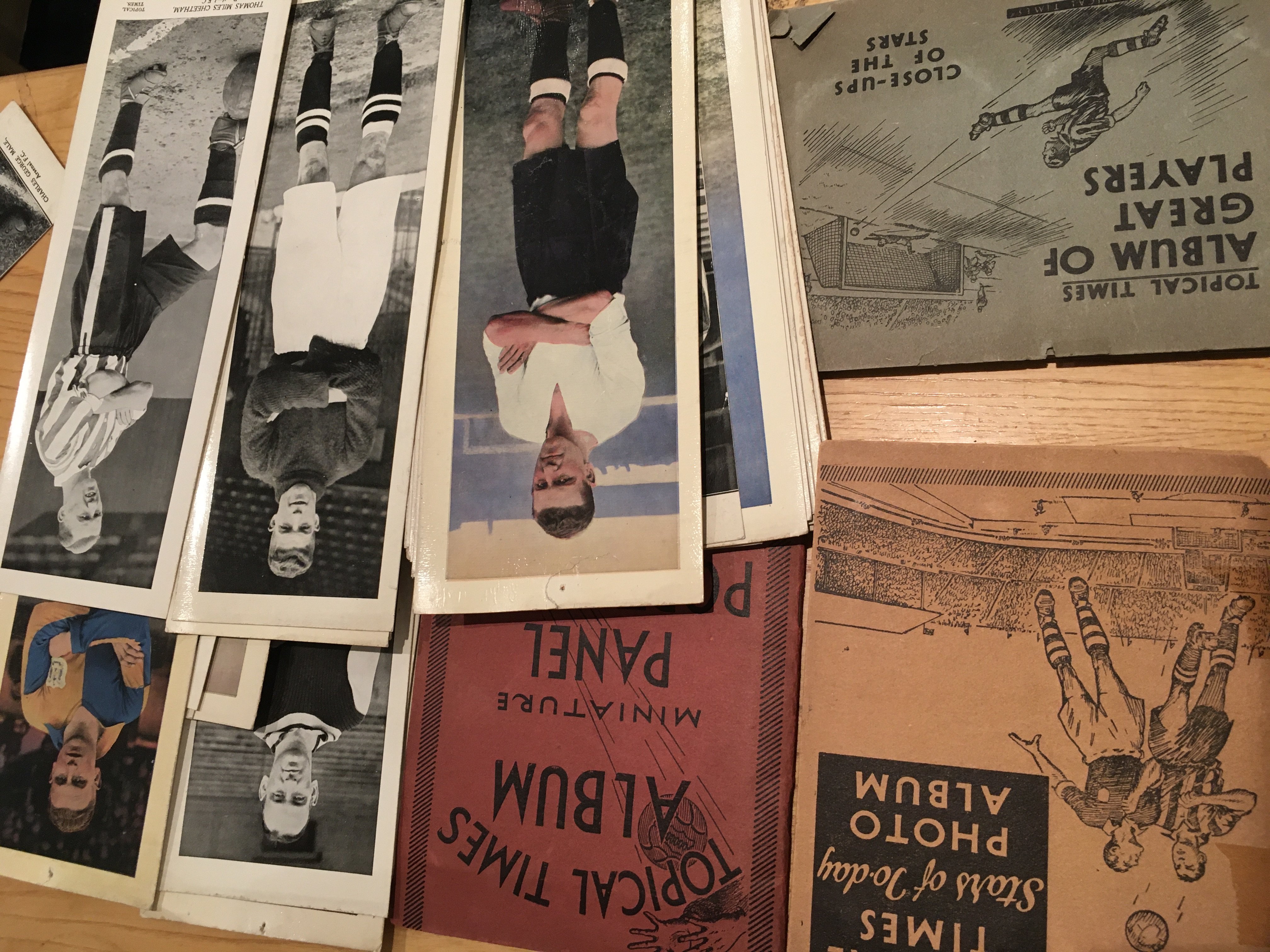 1930s Football Card Collection: 3 different small complete Topical Times Albums with cards clipped in plus 40 of the long single panel portraits in colour and black and white. From 1936 there are 74 Ardath Football Team Groups plus 24 Godfrey Phillips Soccer Stars and 23 International Caps. C/W a full set of 1939 Association Footballers by Wills. Over 300 cards neatly displayed in binder.