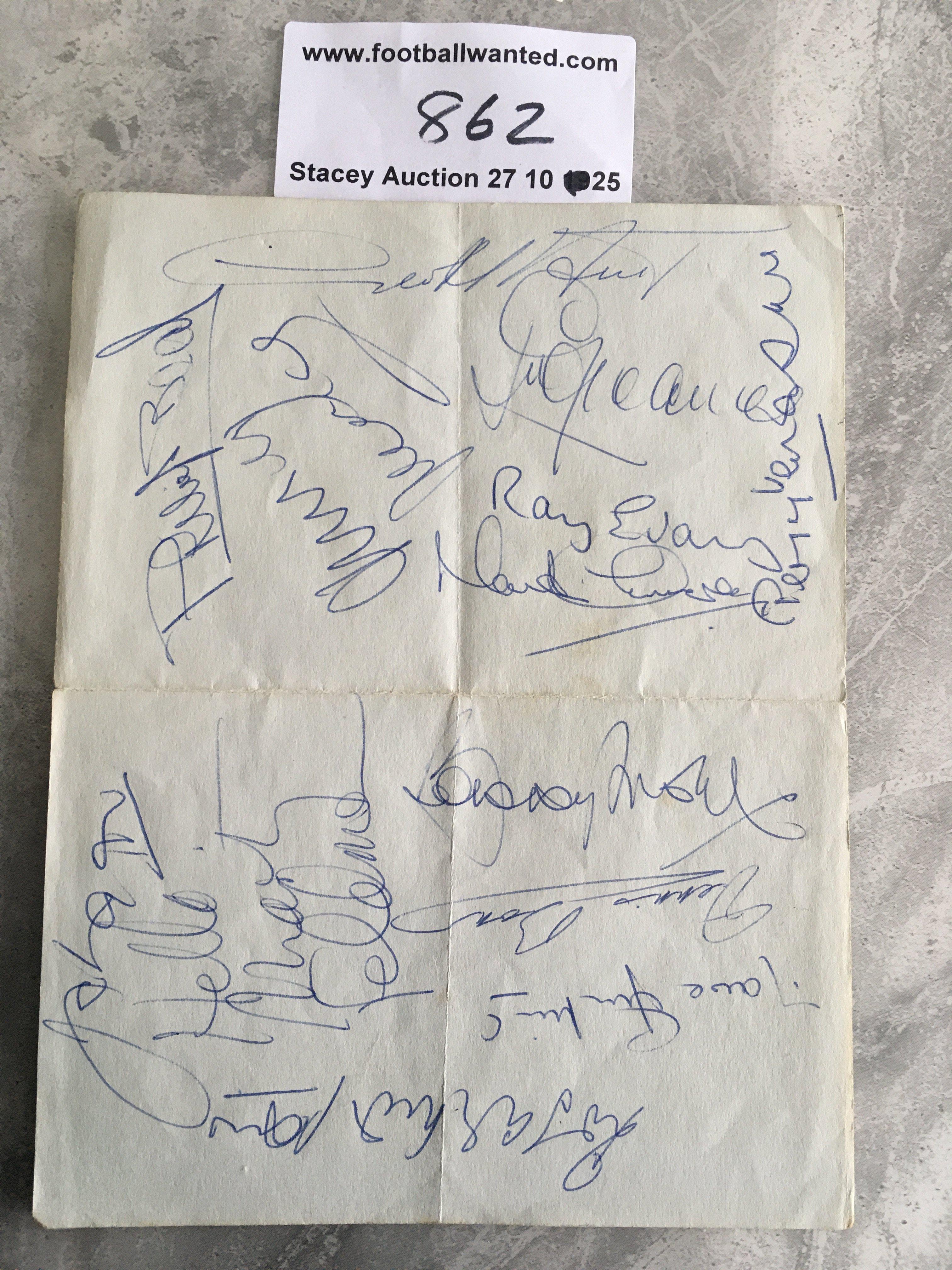1960s West Ham + Tottenham Football Autographs: A folded page signed by West Ham players Bobby Moore and Geoff Hurst. Tottenham players Phil Beal Terry Venables Ray Evans Jimmy Greaves have signed amongst others. The Bobby Moore autograph could be removed for displaying purposes.