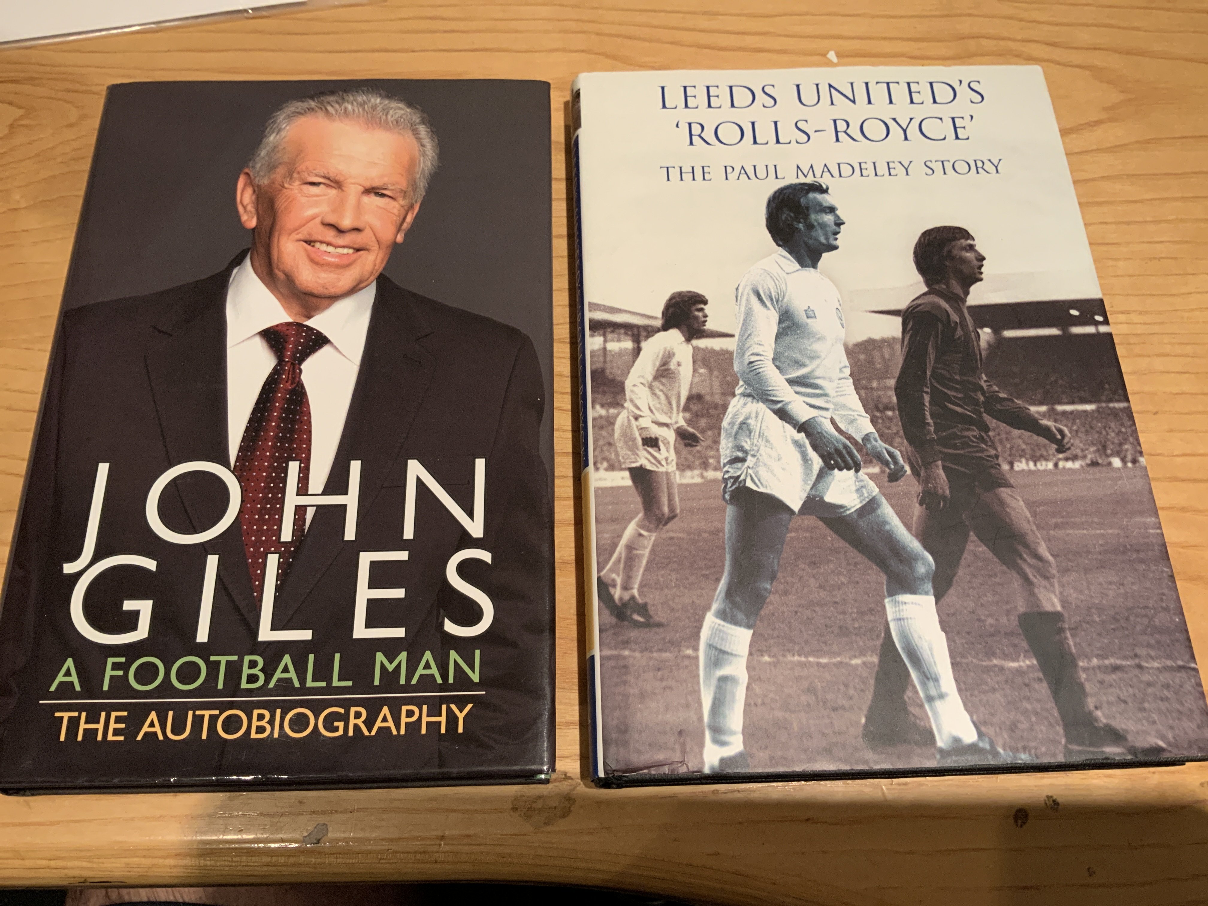 Giles + Madeley Signed Leeds United Football Books: Both excellent condition hardbacks with dust jackets signed without dedication. (2)