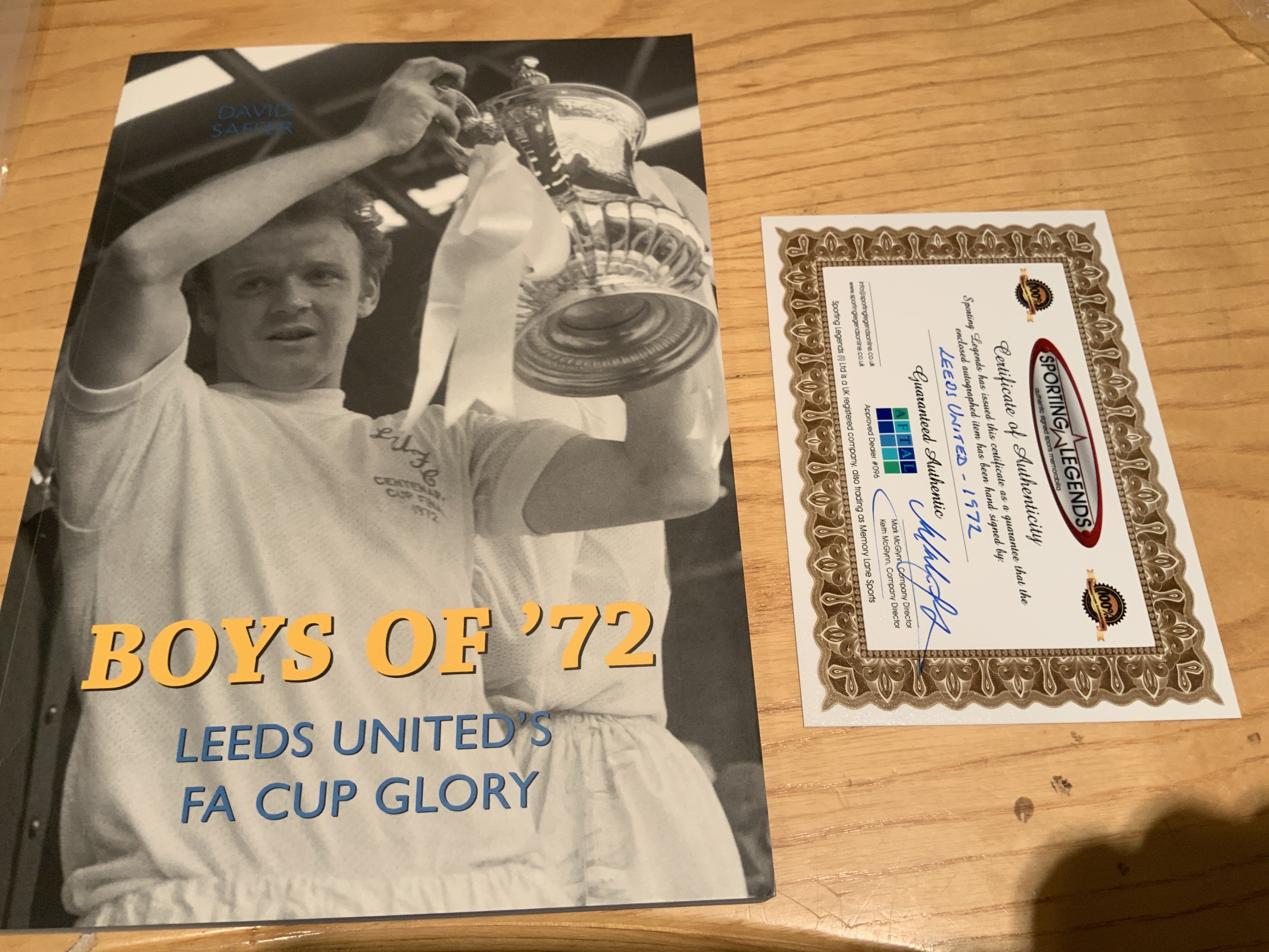 Boys Of 72 Leeds United Multi Signed Football Book: Excellent soft cover book signed on one page by 9 players including Hunter Gray Clarke Reaney Harvey Charlton and Jones. COA from reputable source.
