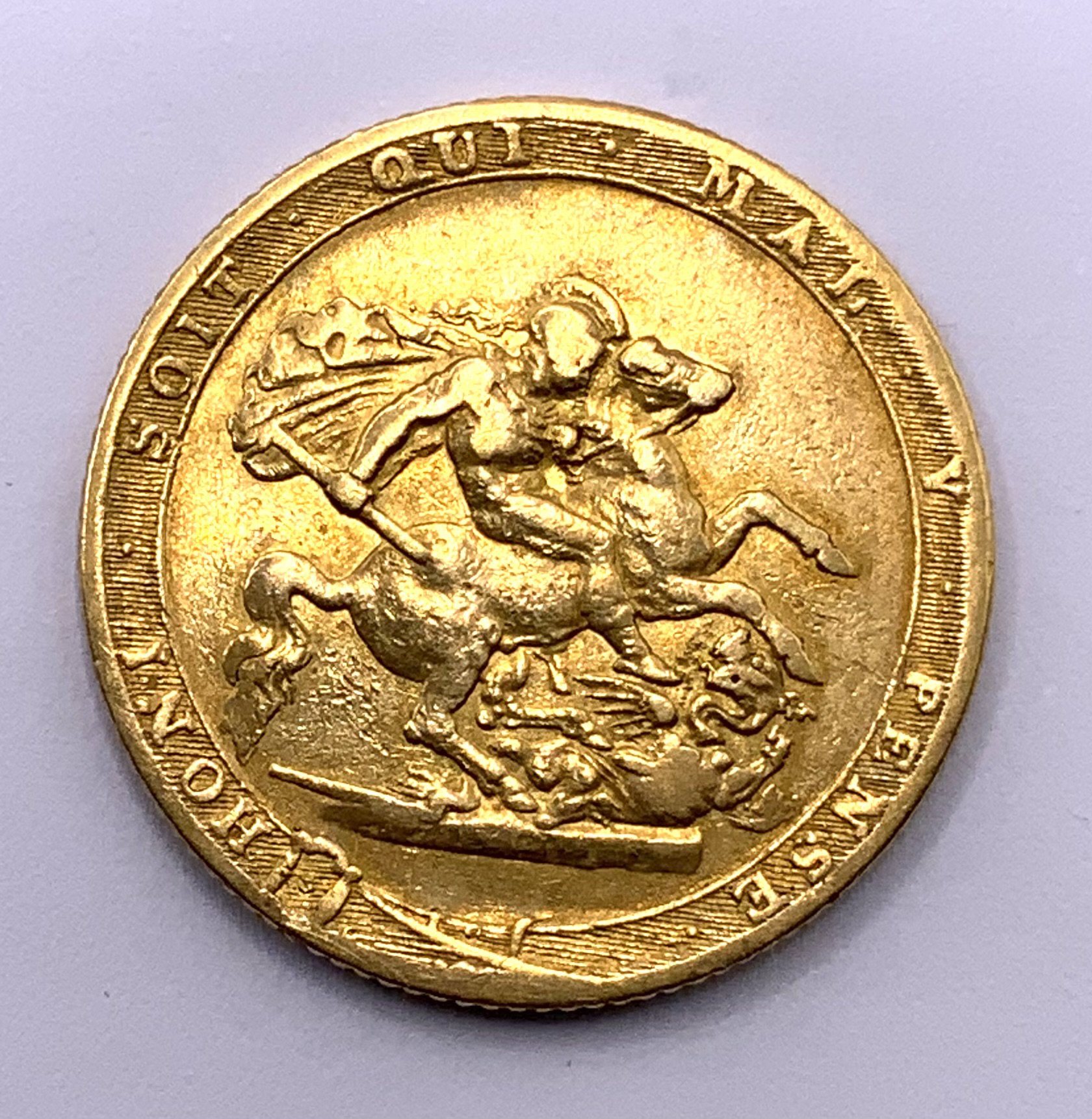 Great Britain, GEORGE III Sovereign, 1820. A George III Sovereign, laureate head Reverse with St George and the Dragon within a garter. Dated 1820, Some rubbing to surfaces.