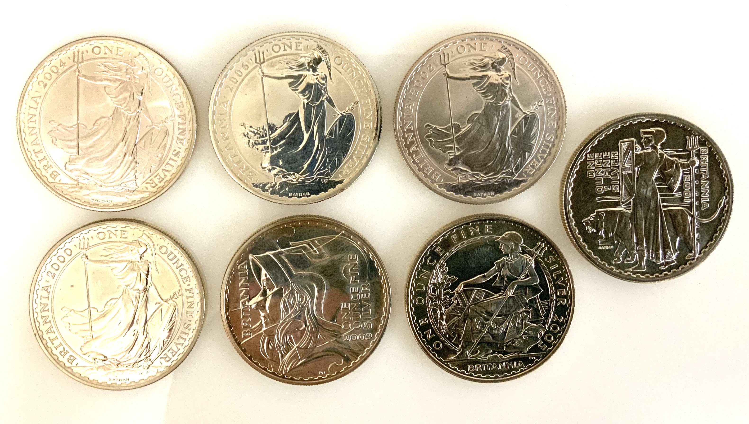 7 Brittania Silver 1OZ coins. 2000-2006. (A)