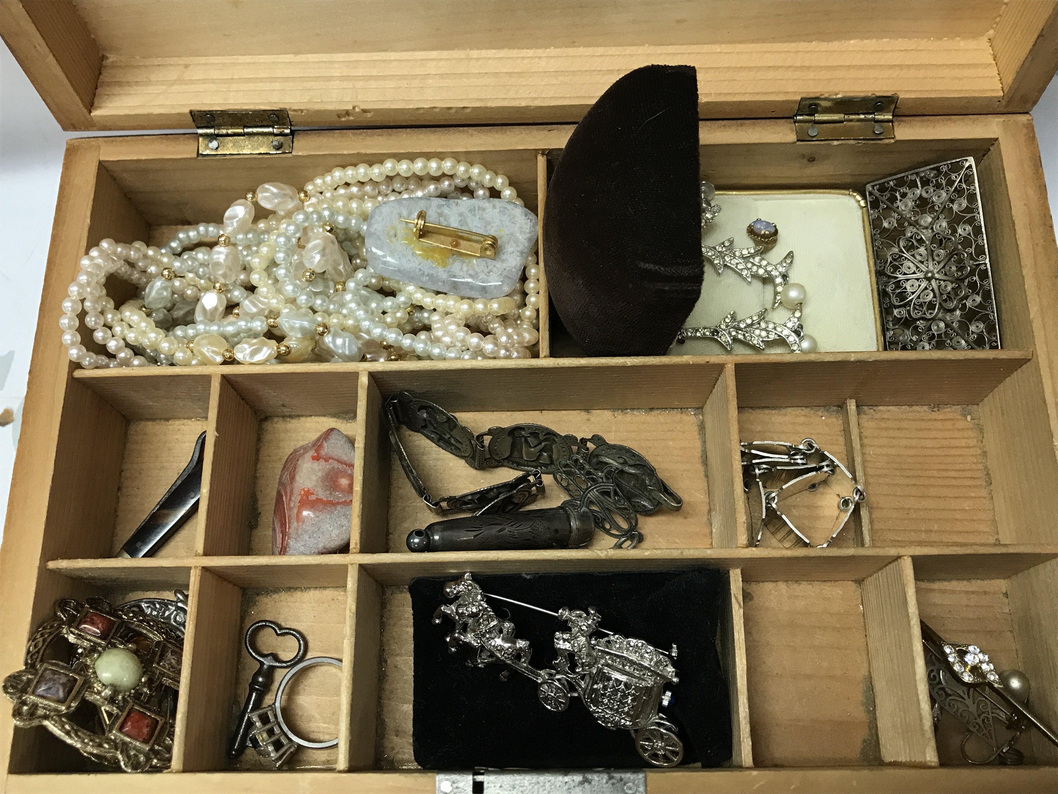 A collection of costume Jewellery including necklaces, brooches, earrings. Postage category B