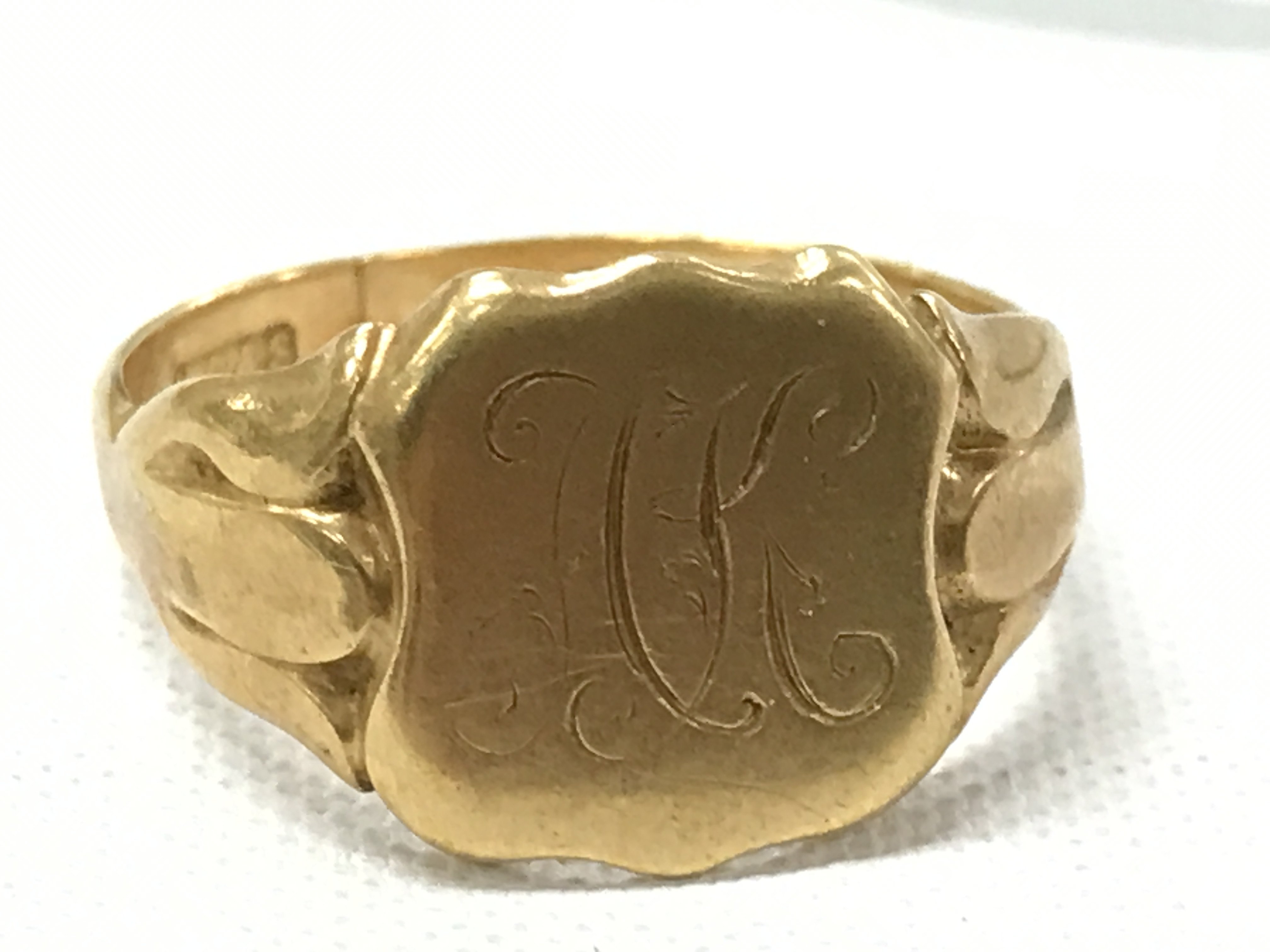 An 18ct late Victorian signet ring , 6.1g total weight. Size O. Postage category A