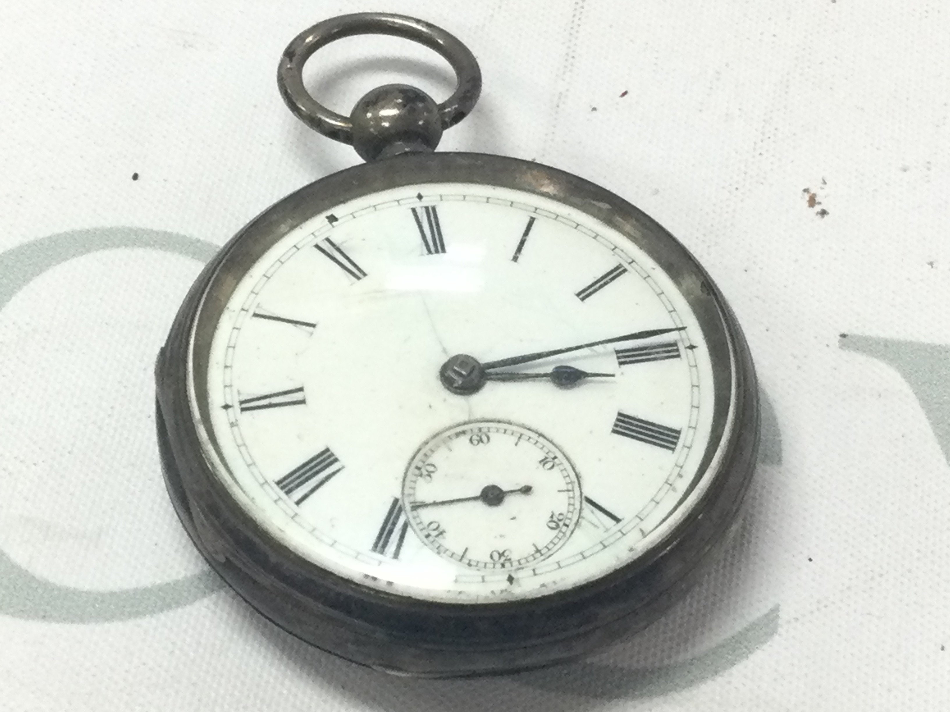 A silver pocket watch