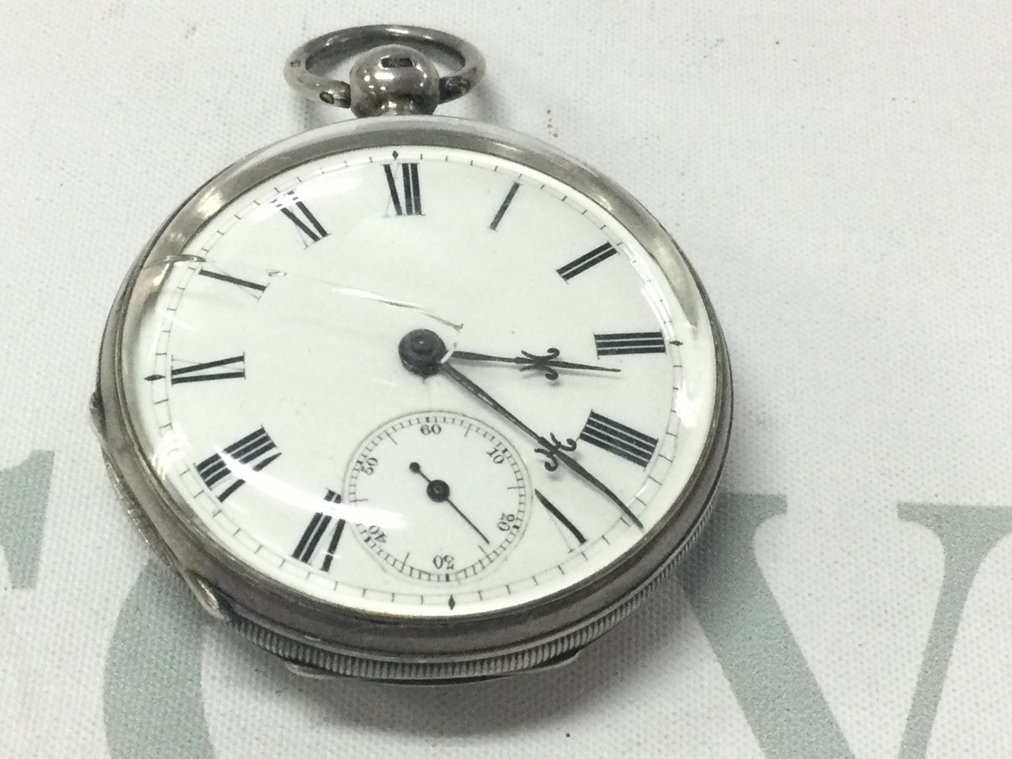 A silver pocket watch