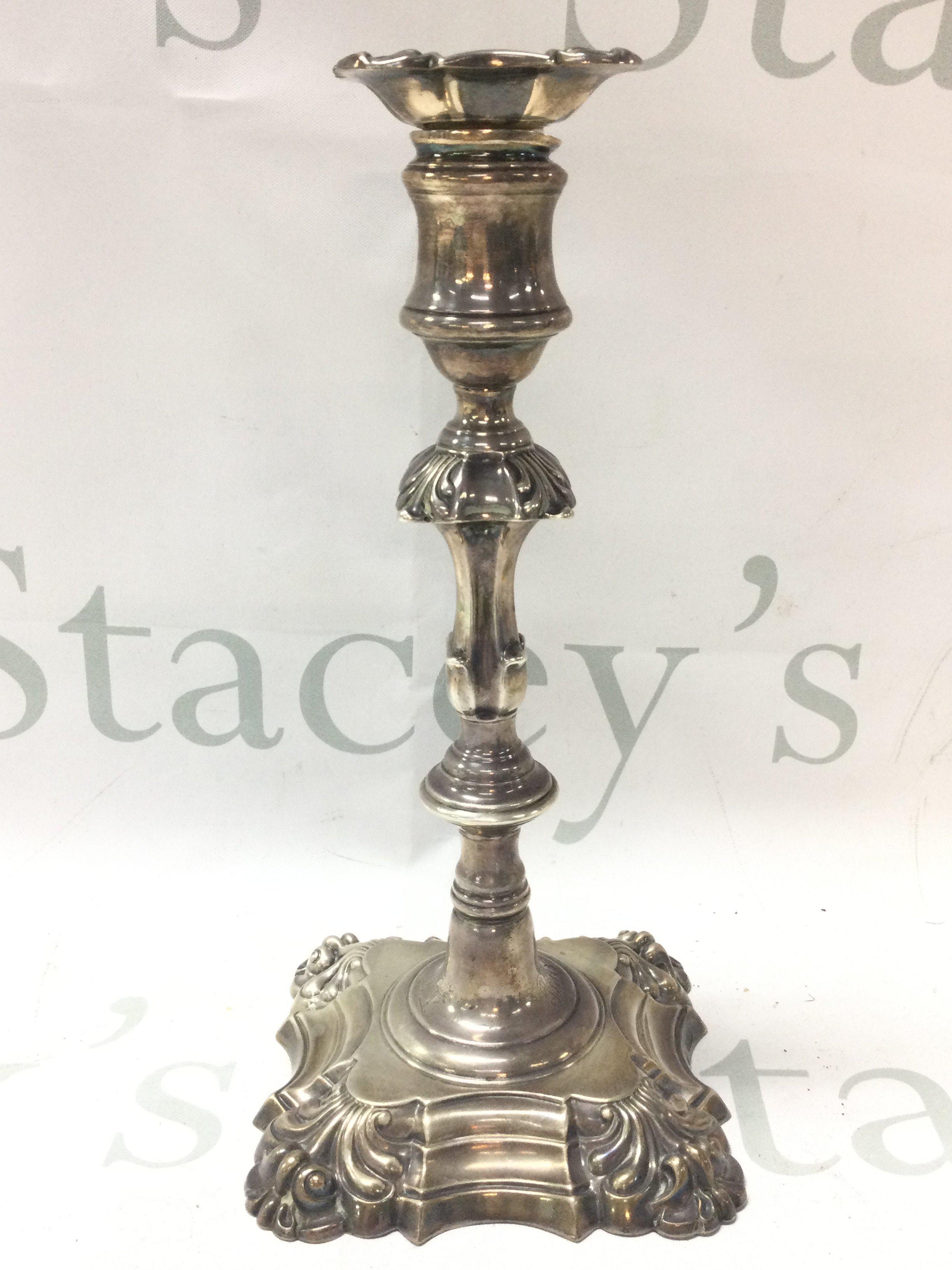 A single Georgian silver candlestick , 23.5cm tall approximately. Postage category B