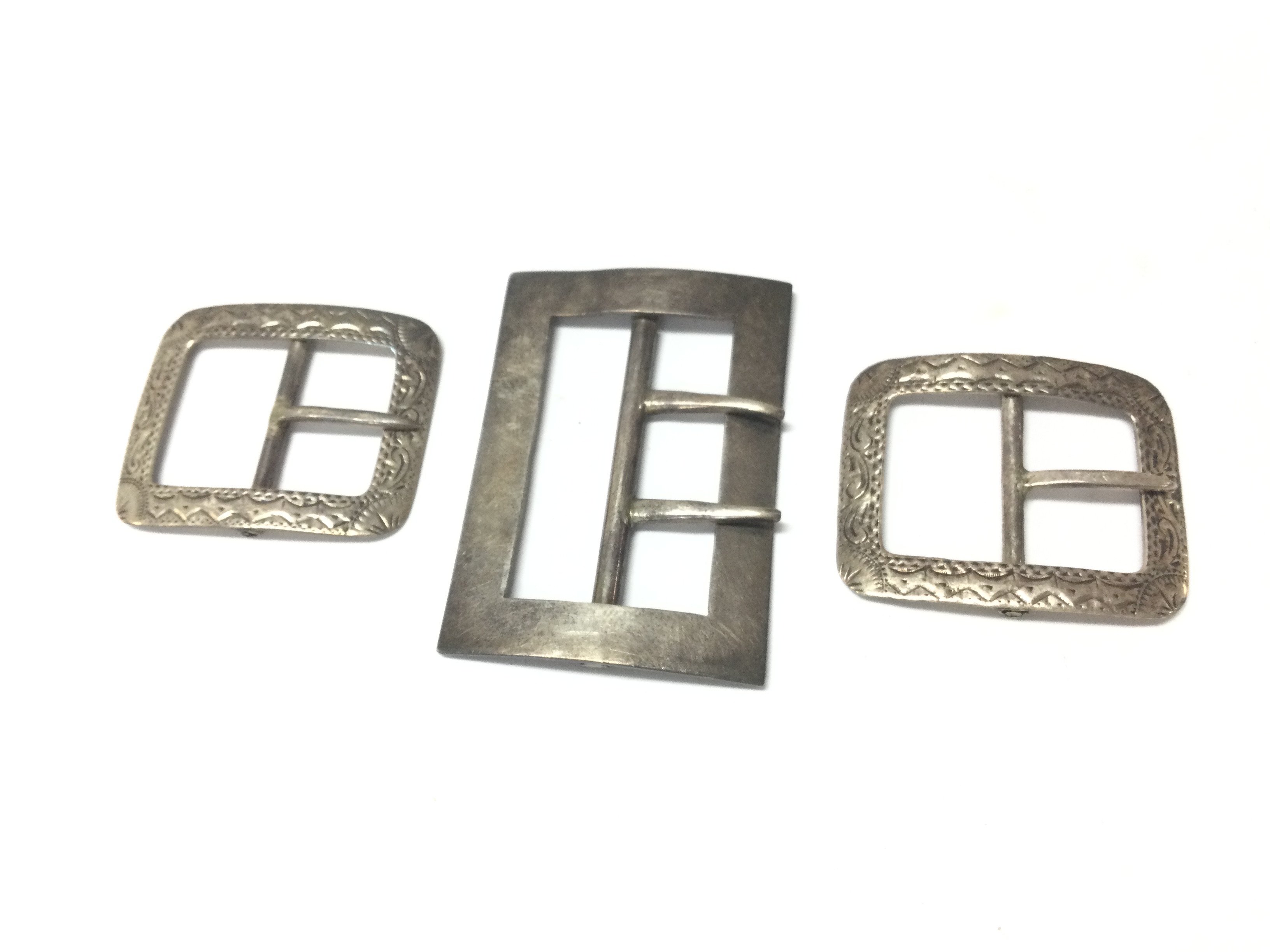 Three silver hallmarked buckles , postage category A