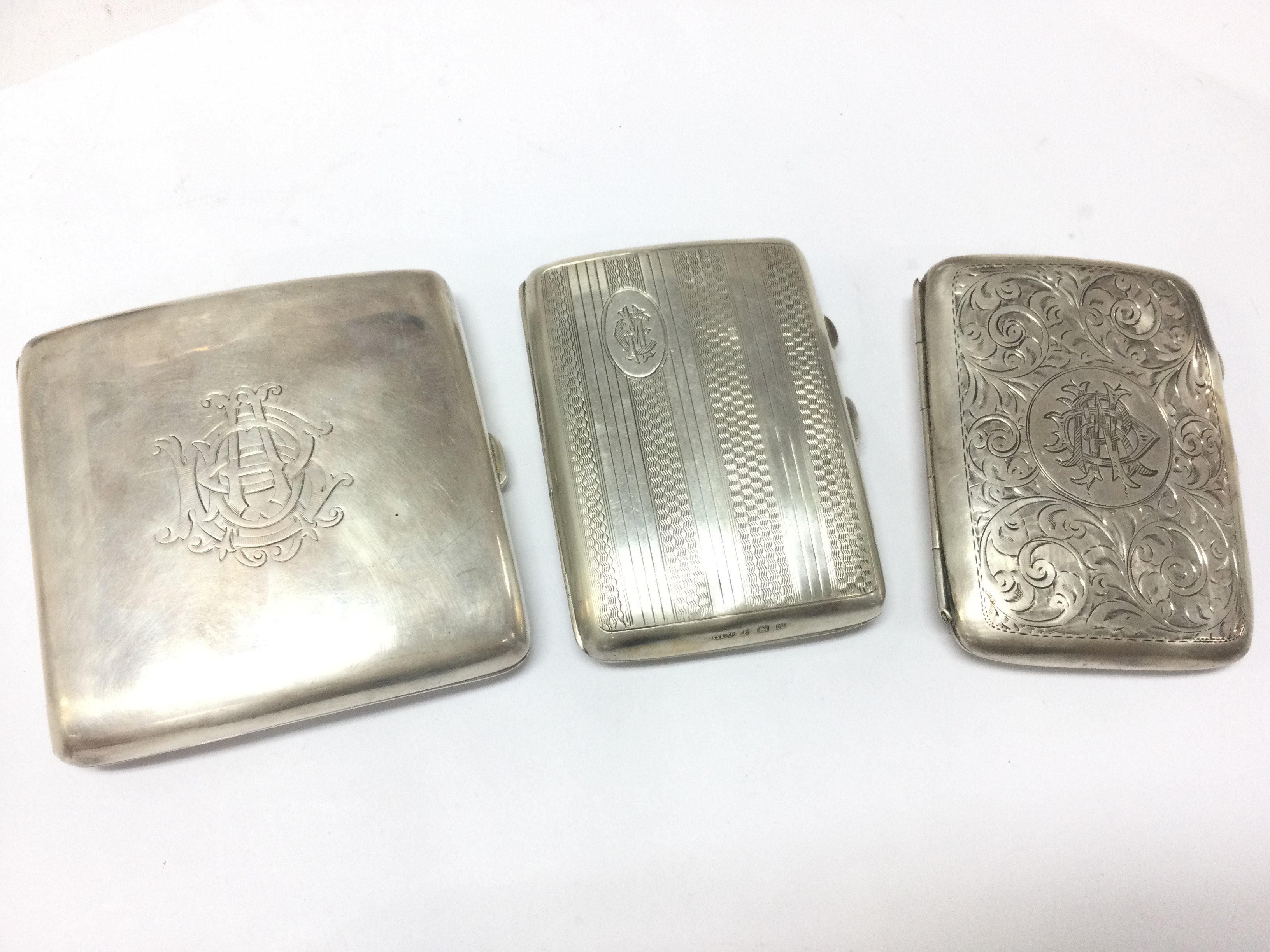 Silver hallmarked cigarette cases , one silver cigarette case tortoiseshell lined. Postage category B