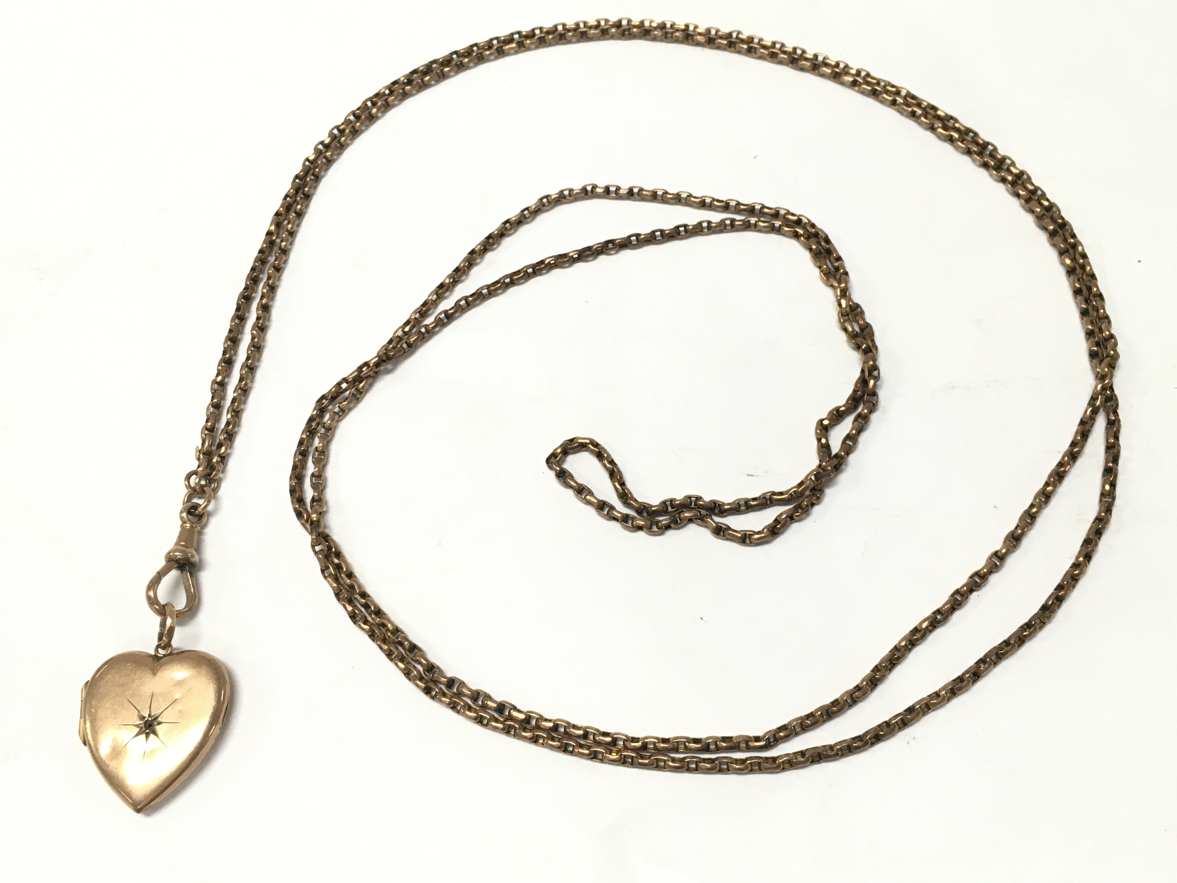 9ct gold muff chain and heart pendant , 22.5g total weight. Postage category A