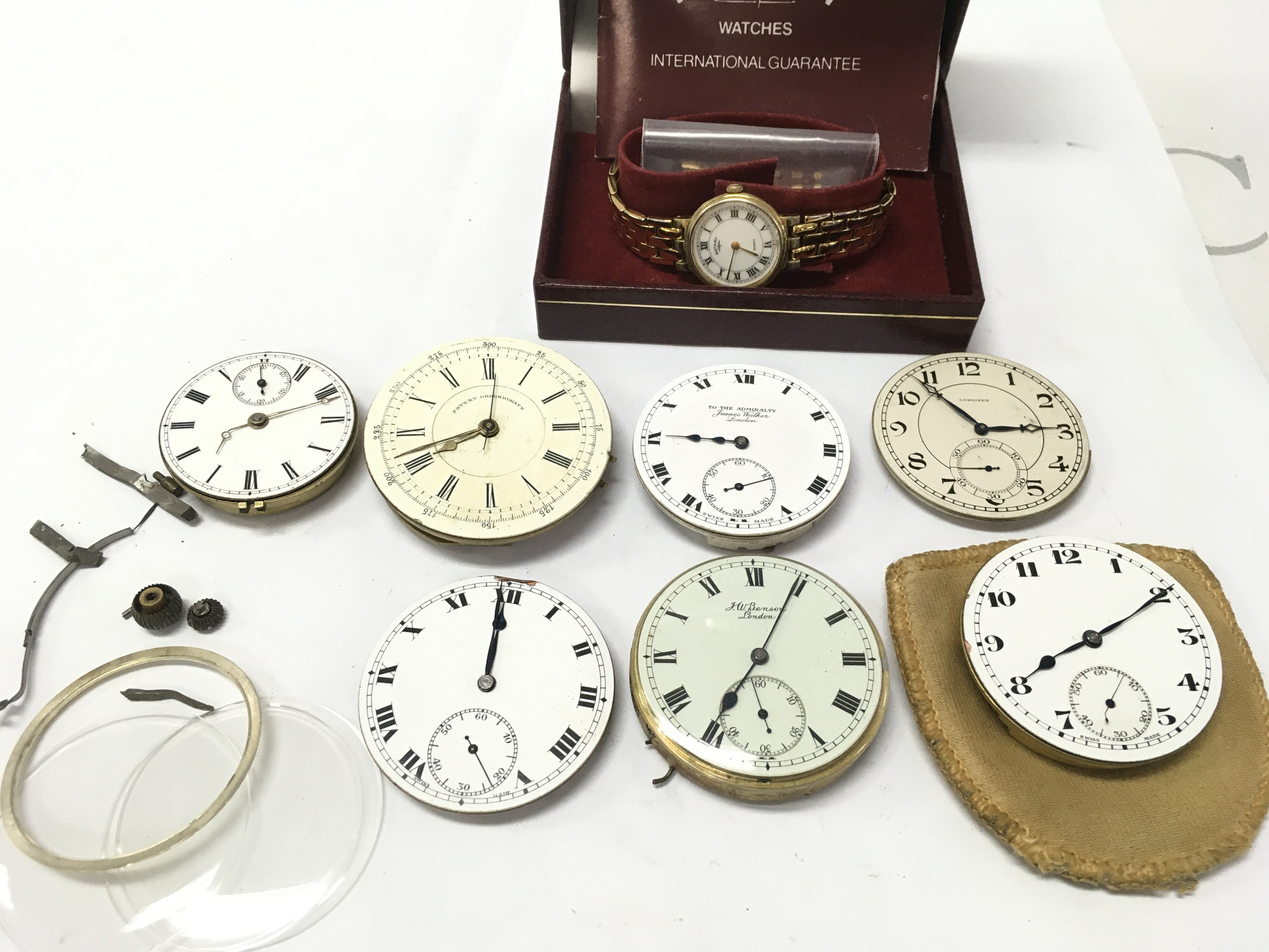 A boxed Rotary watch and a collection of vintage uncased pocket watches including J.W Benson, James Walker, Longines . Postage category B