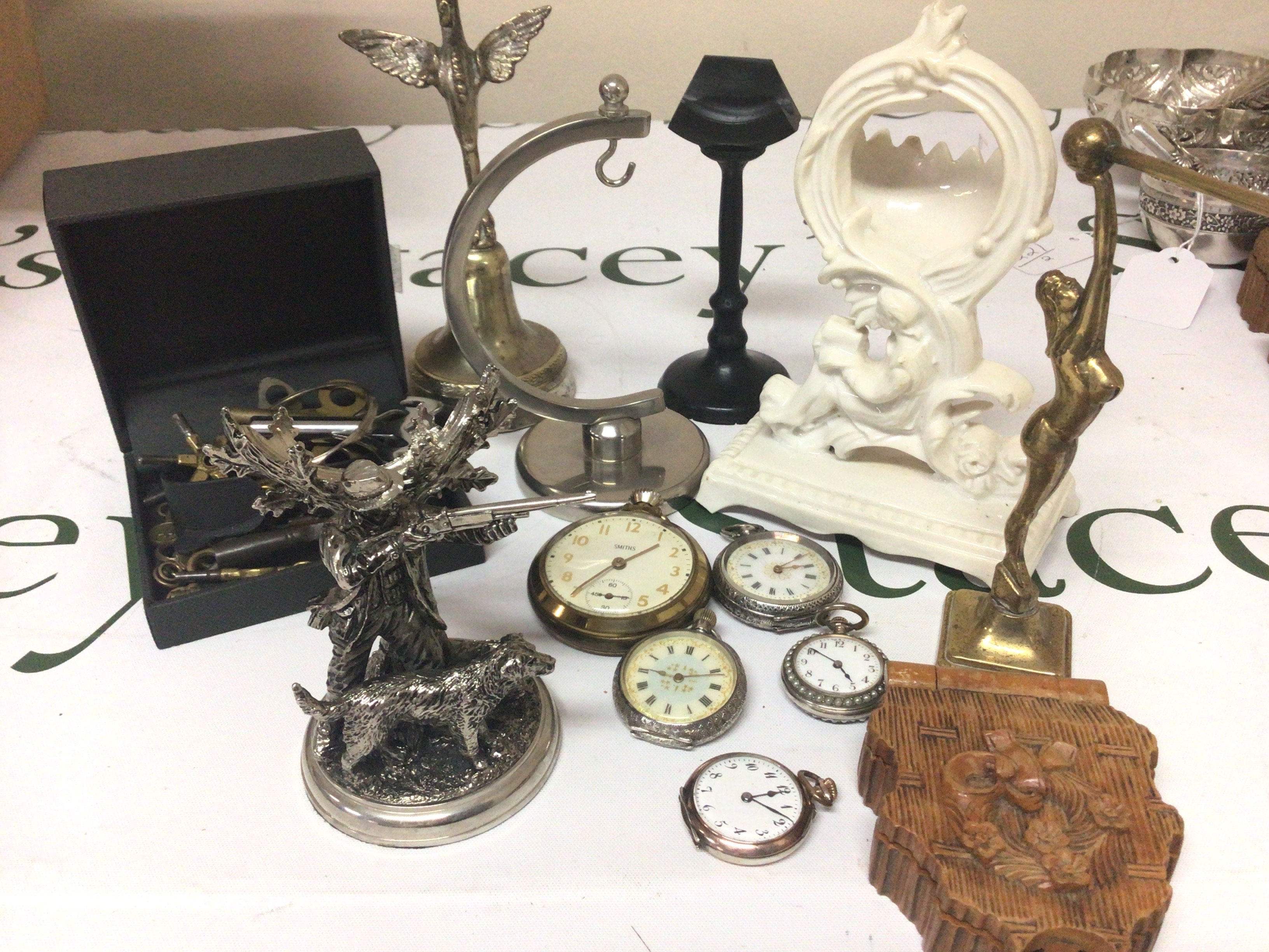 A Collection of Continental silver fob watches a collection of watch stands and a a mixed lot of watch keys.