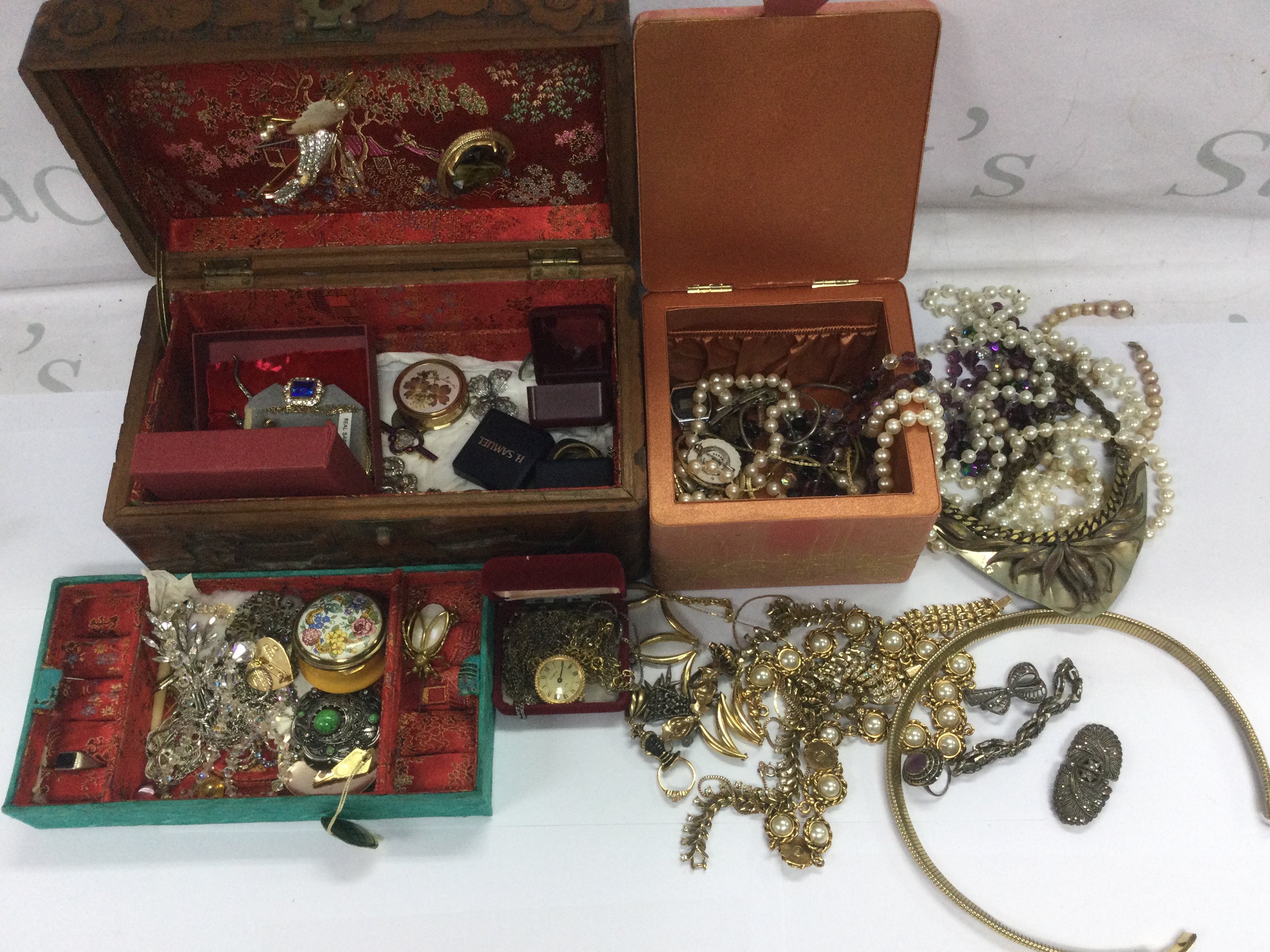 Two jewellery boxes containing a collection of costume jewellery (2). Shipping category C.