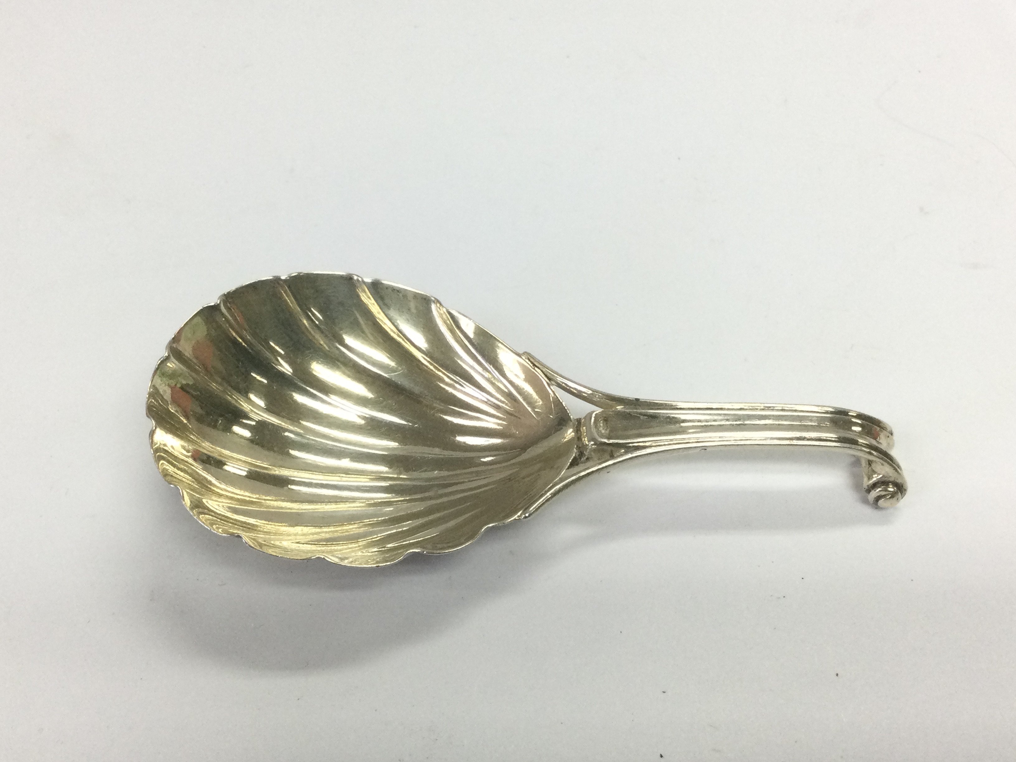 A Georgian silver caddy spoon. Shipping category A.