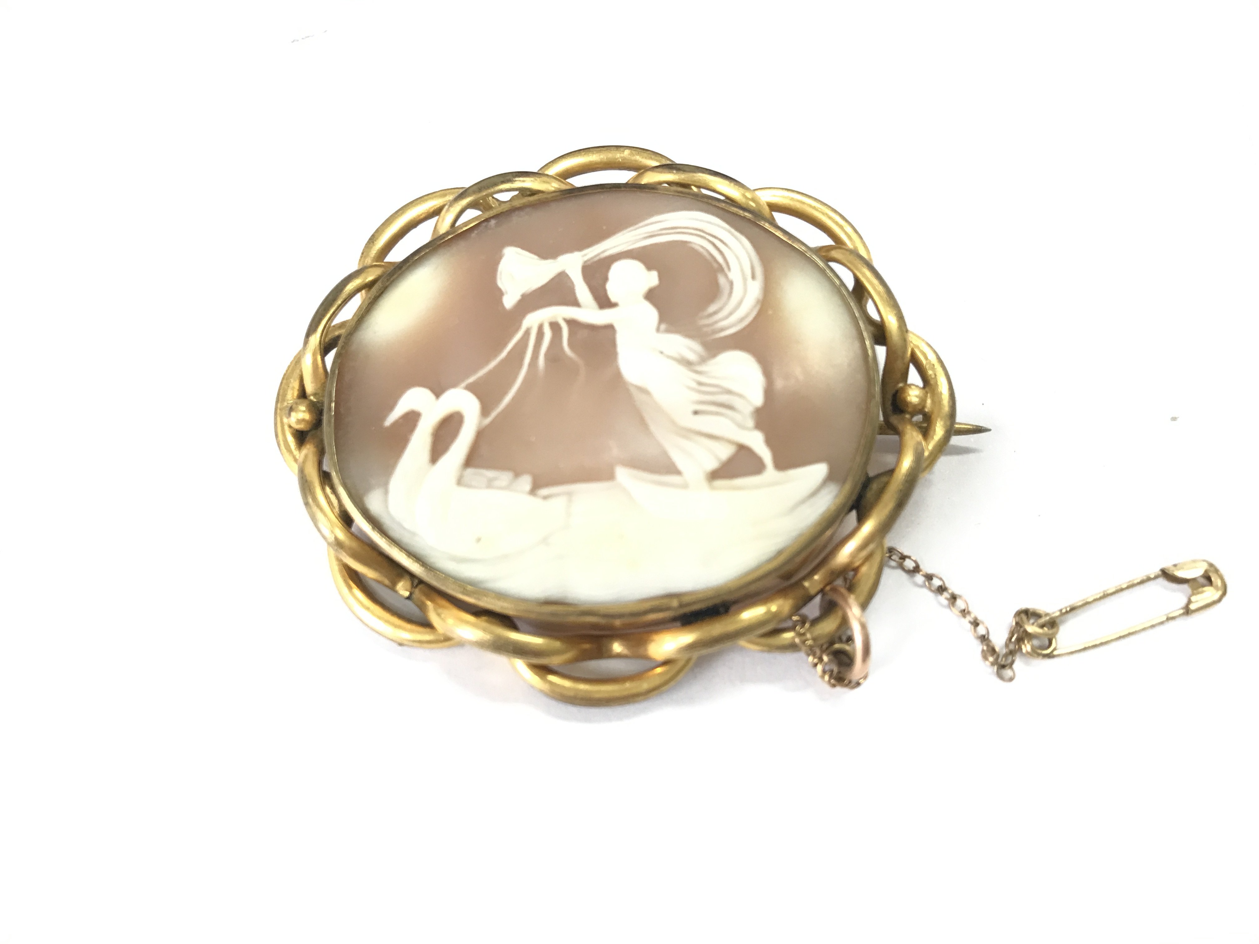 A Victorian cameo brooch. Approximately 60mm wide.