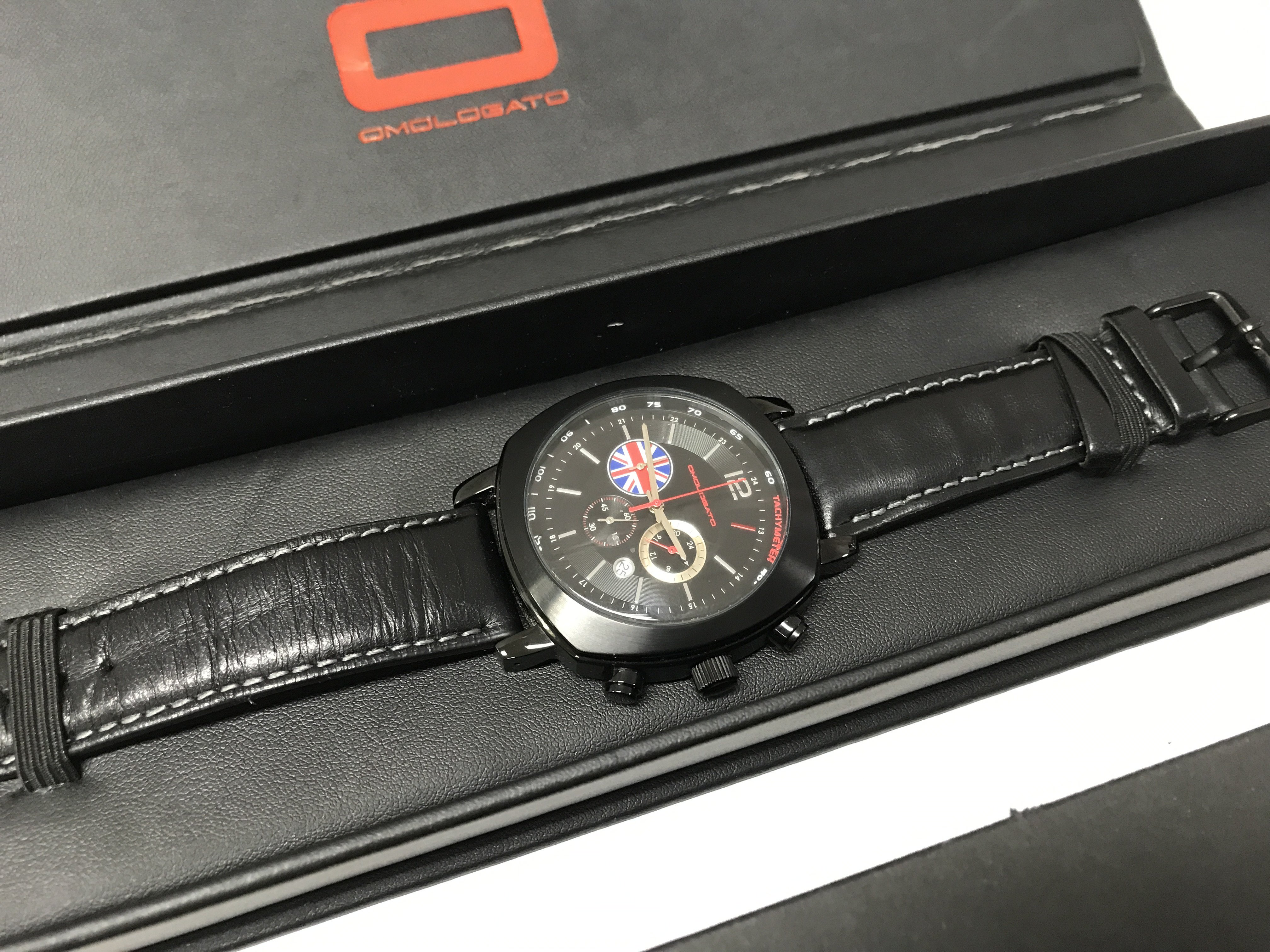 A boxed Omologato Mahindra Racing Formula E team Gents wrist watch. Postage category B