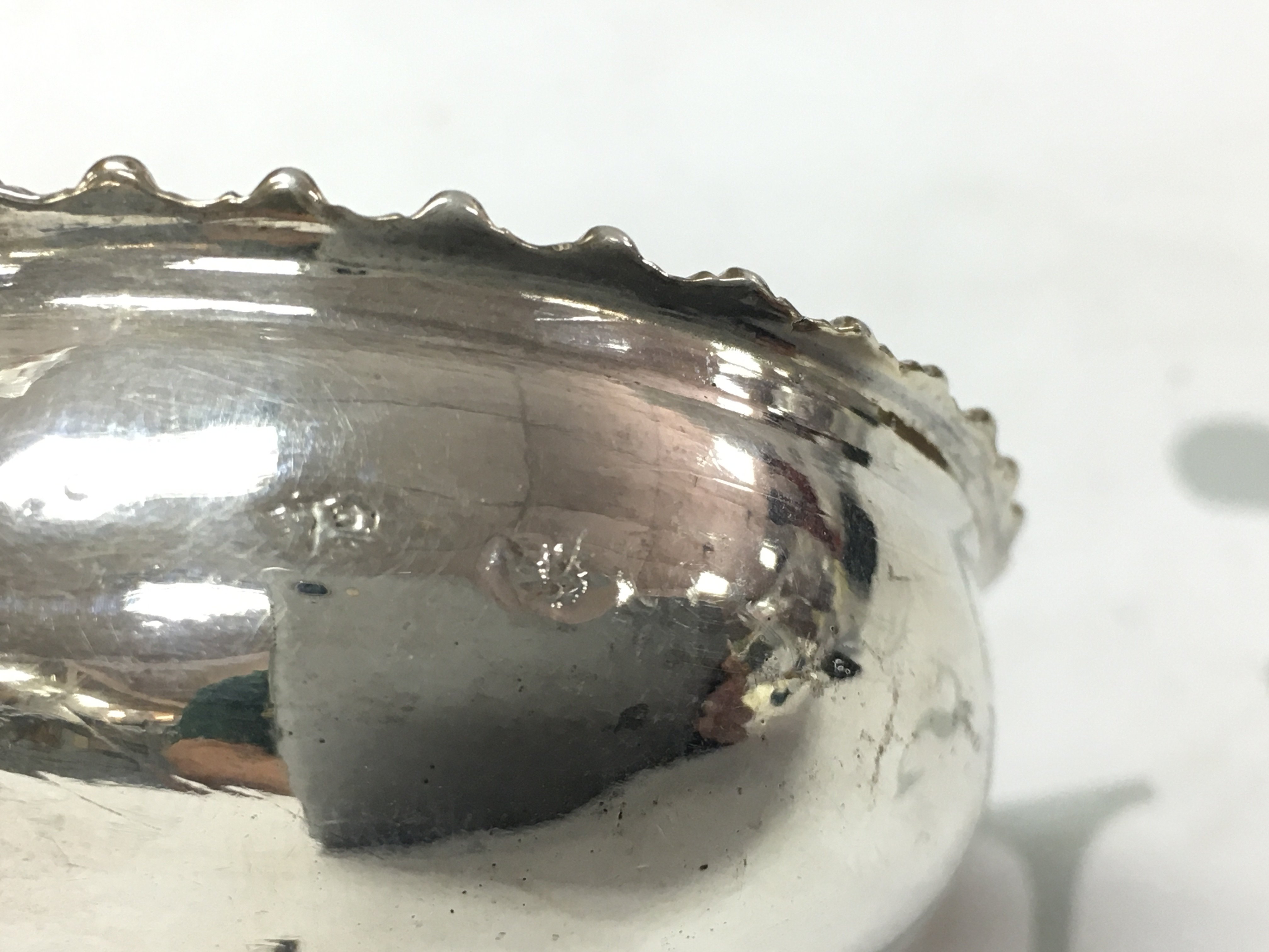 An 18th century silver wine funnel.