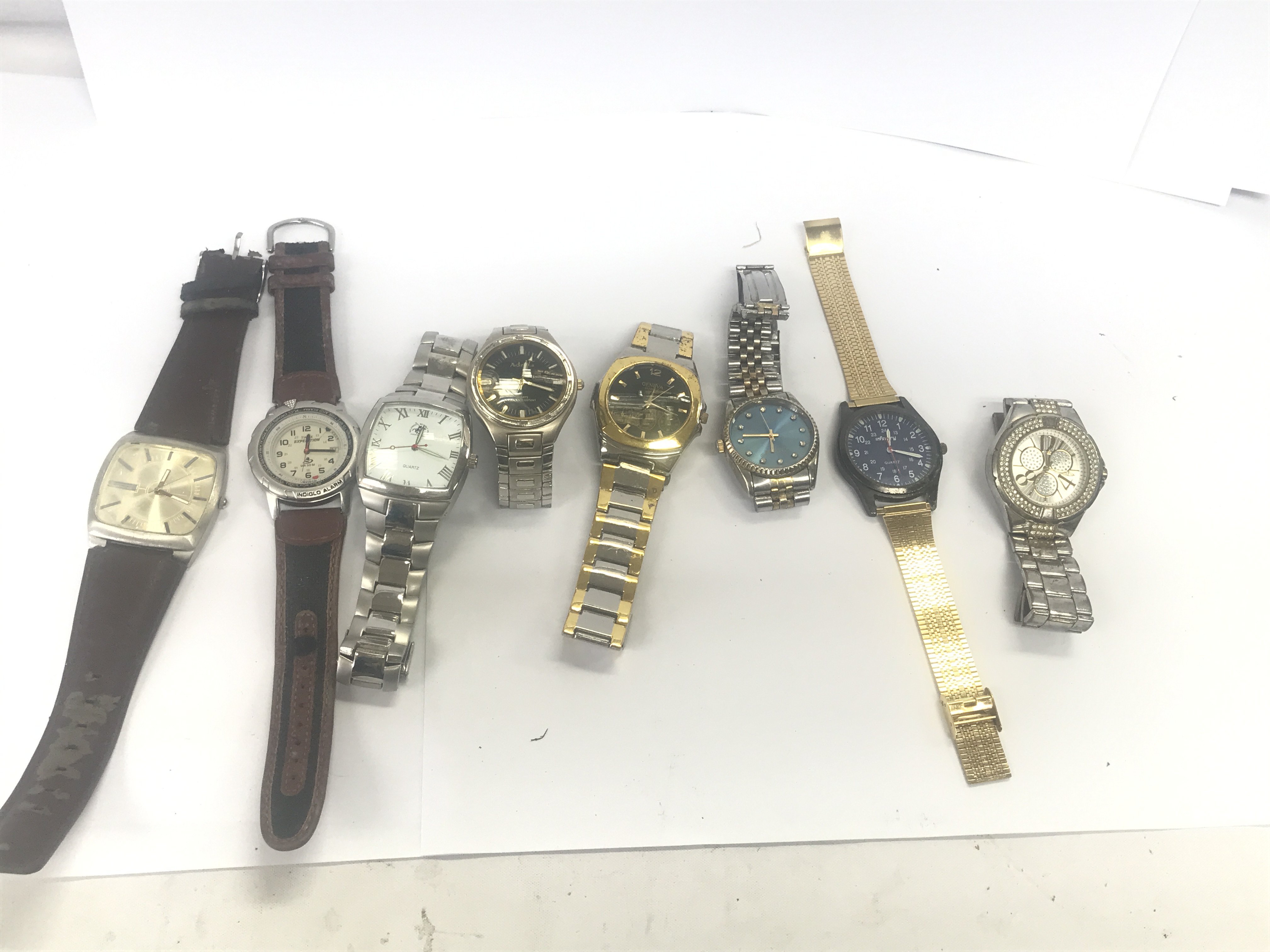 A collection of 8 Gents watches - all seen working