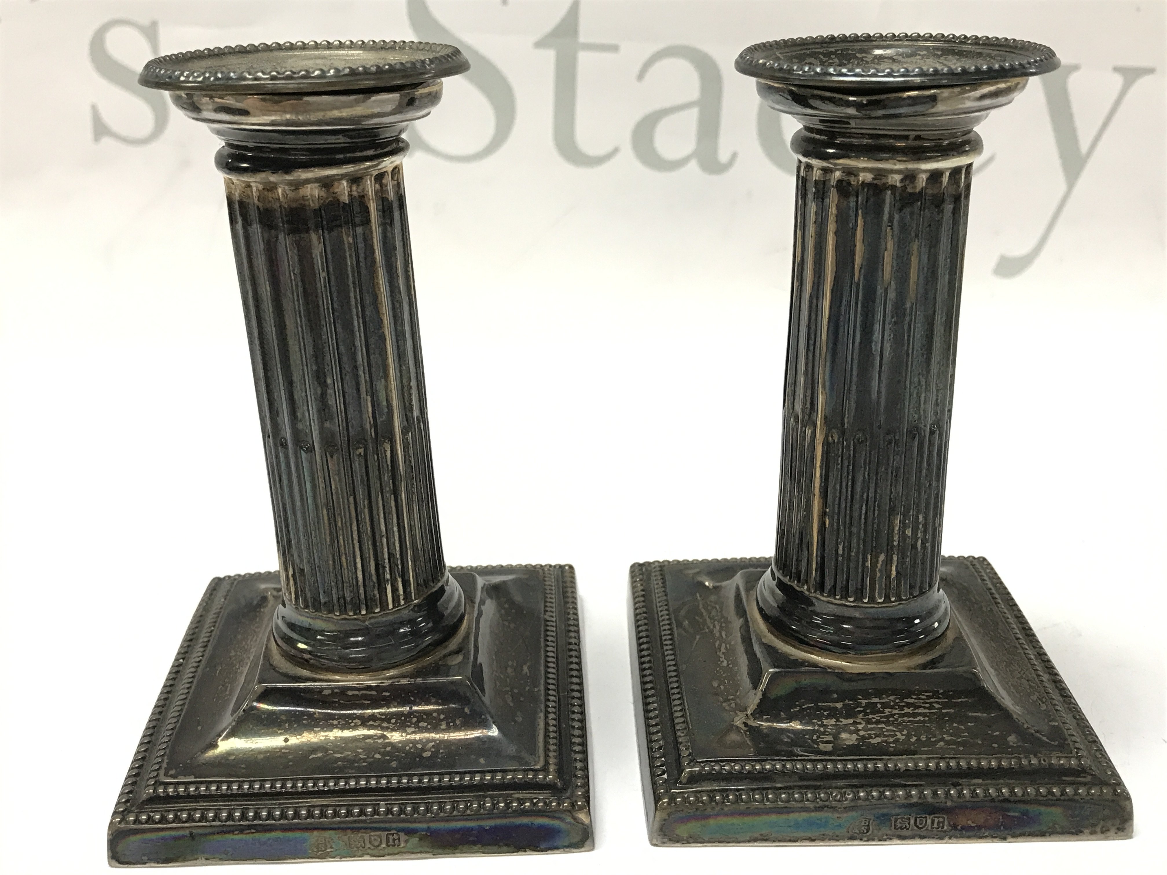 Silver Hallmarked Corinthian style candlesticks ,postage category B
