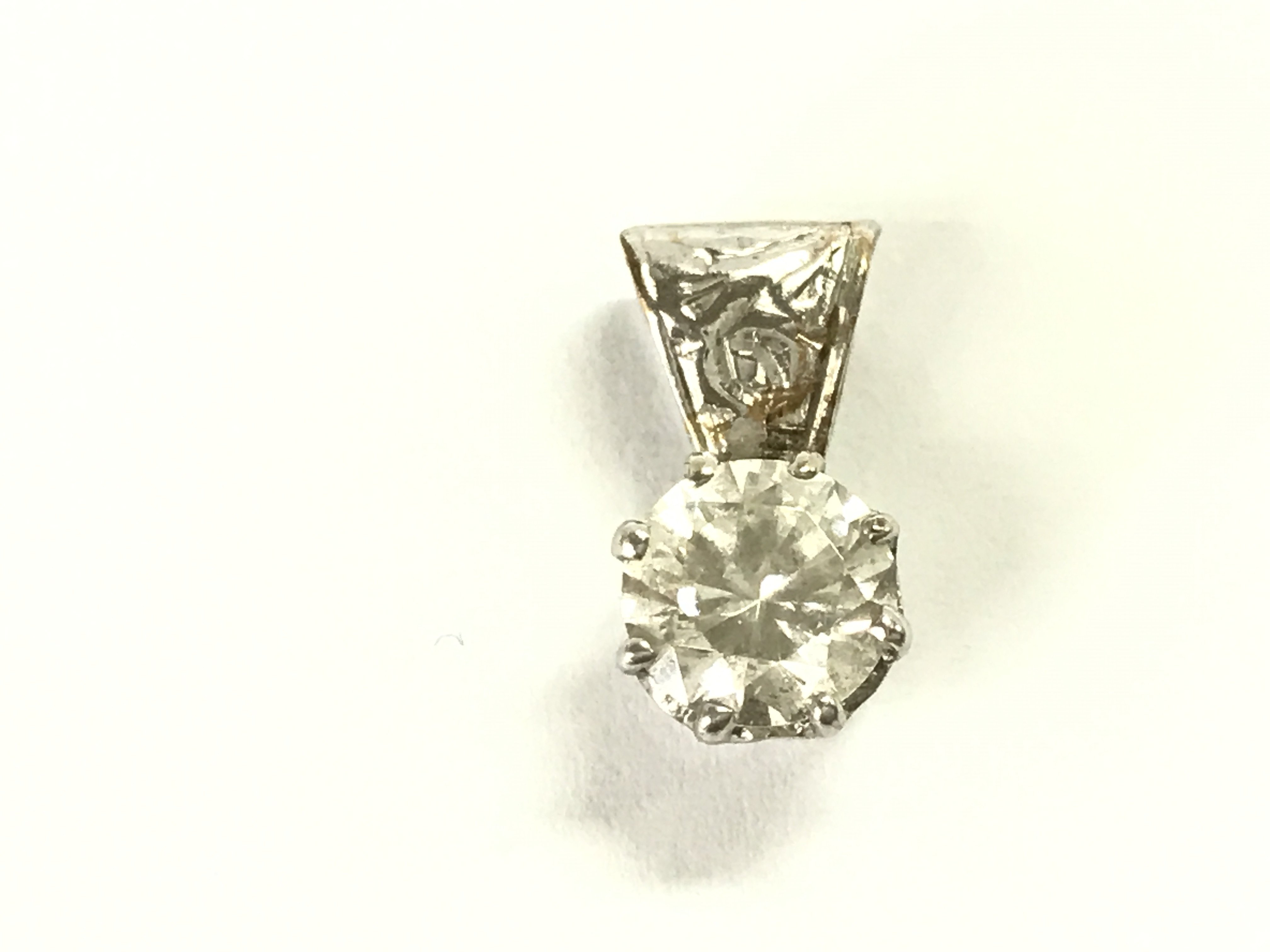 A diamond pendant approximately 0.85ct. Postage A