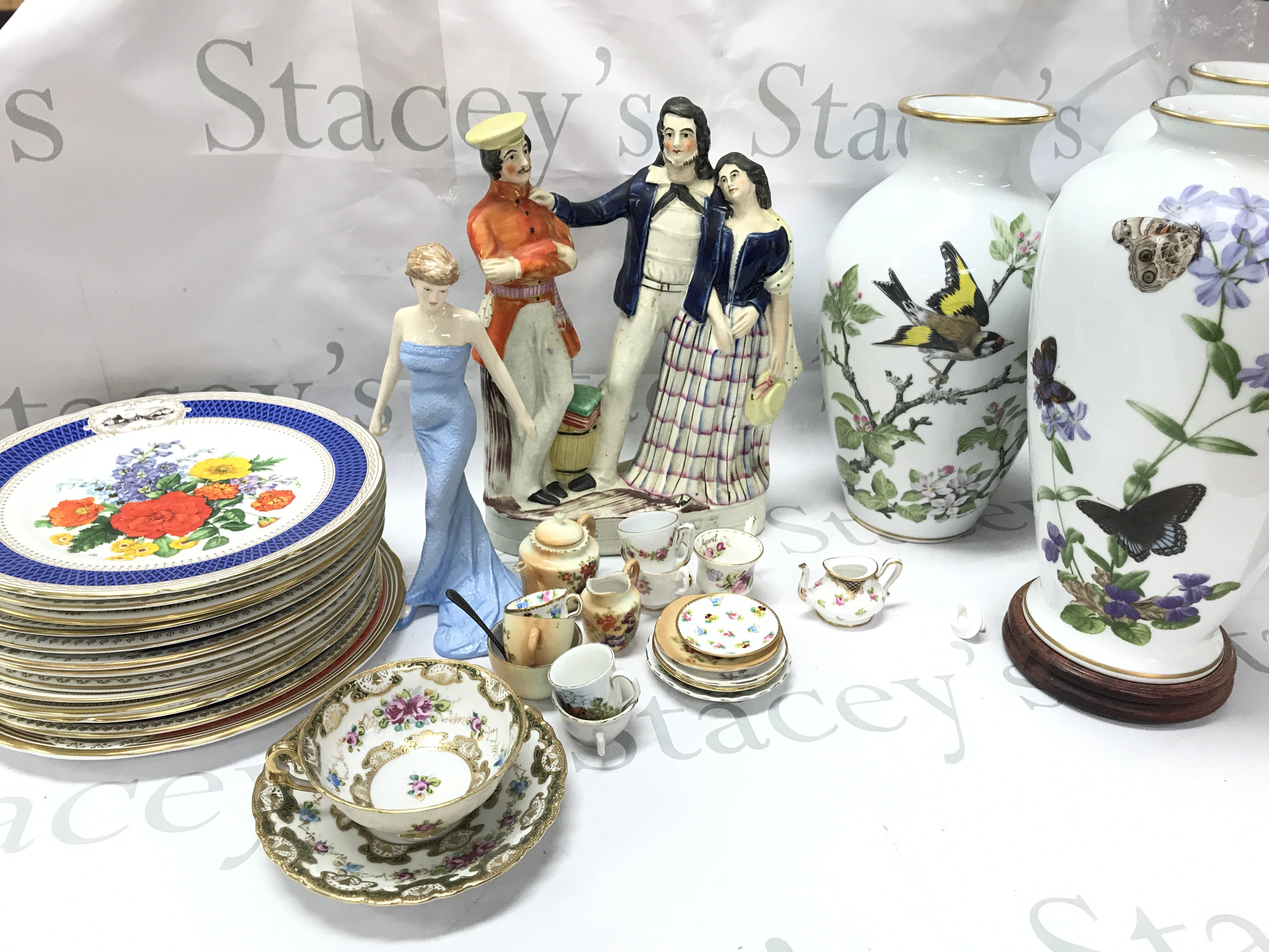 A collection of ceramics including Staffordshire The Rescue figure group, Doulton Diana figure, Royal horticultural society 1983 Chelsea flower show plates, Franklin John Wilkinson vases . This lot cannot be posted