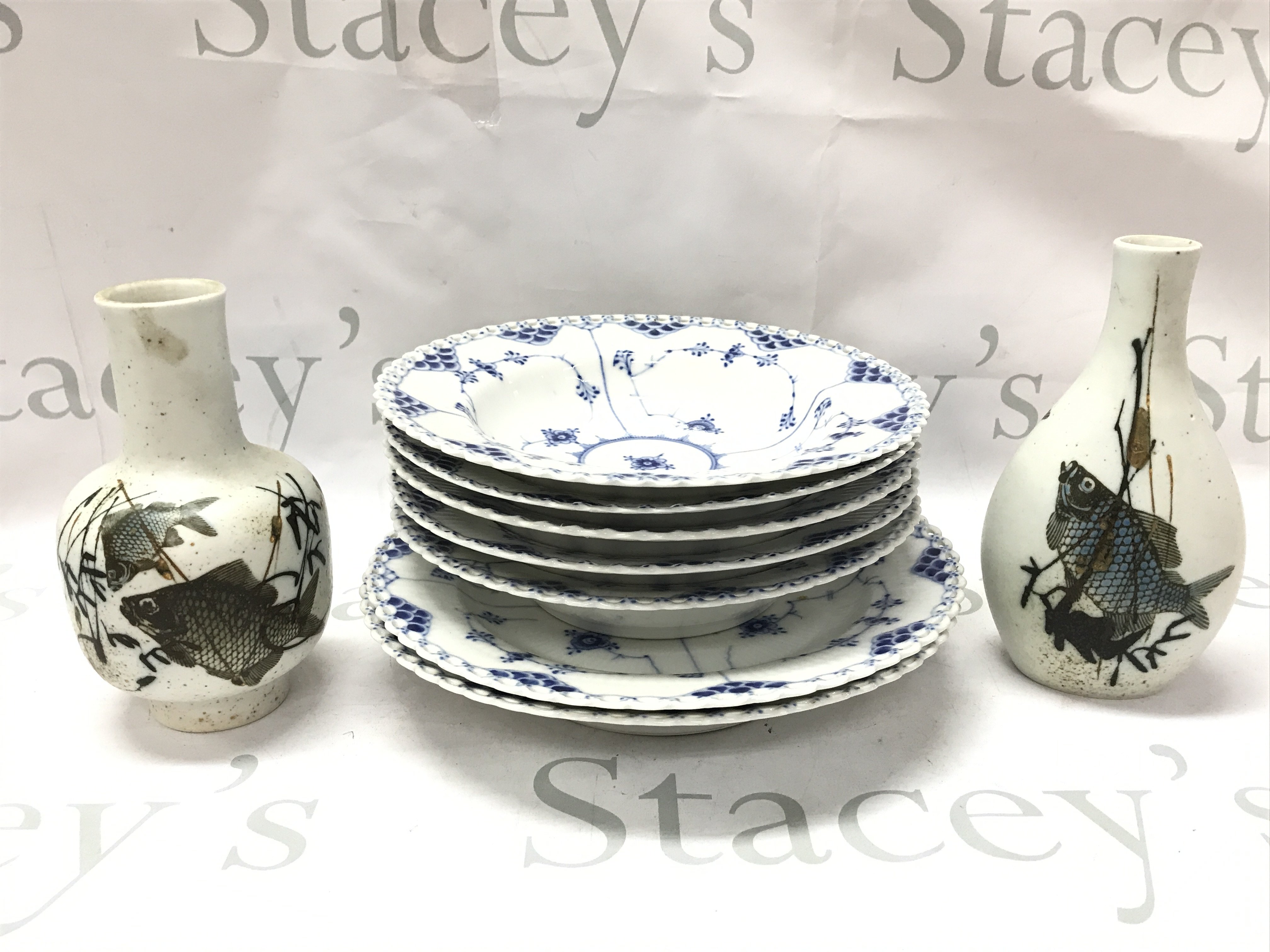 Royal Copenhagen blue fluted full lace plates and Diana Faience Copenhagen fish vases . This lot cannot be posted
