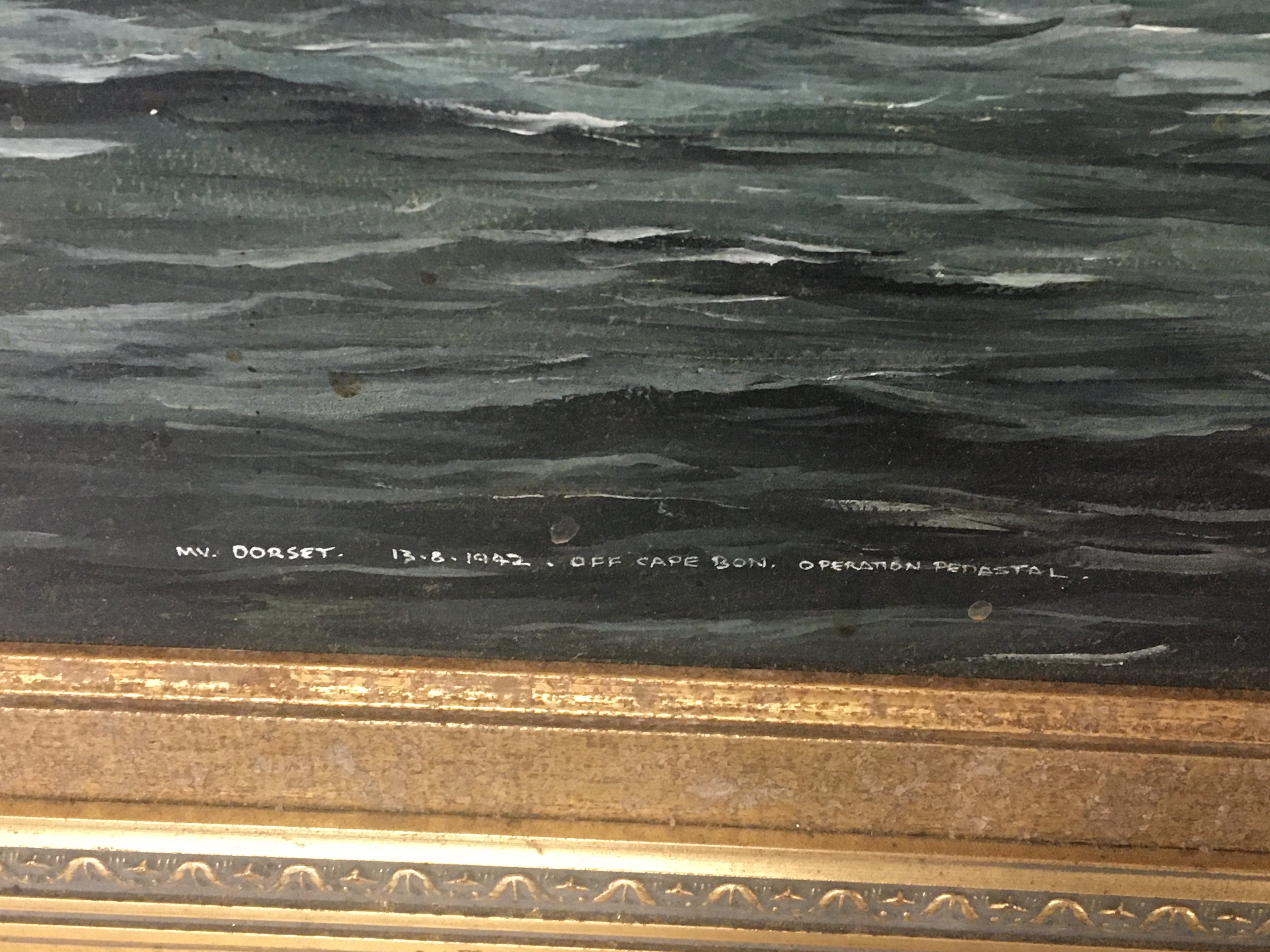 A framed oil painting on board Marine study of SS Dorset of Cape Bon during operation Pedestal. 13.8 1942 a convoy of ships sent to give relief and supplies to Malta which engaged with the enemy and incurred the loss of several merchant ships and Royal Navy ships. The painting signed by the artist Robert G Lloyd. 93x69cm