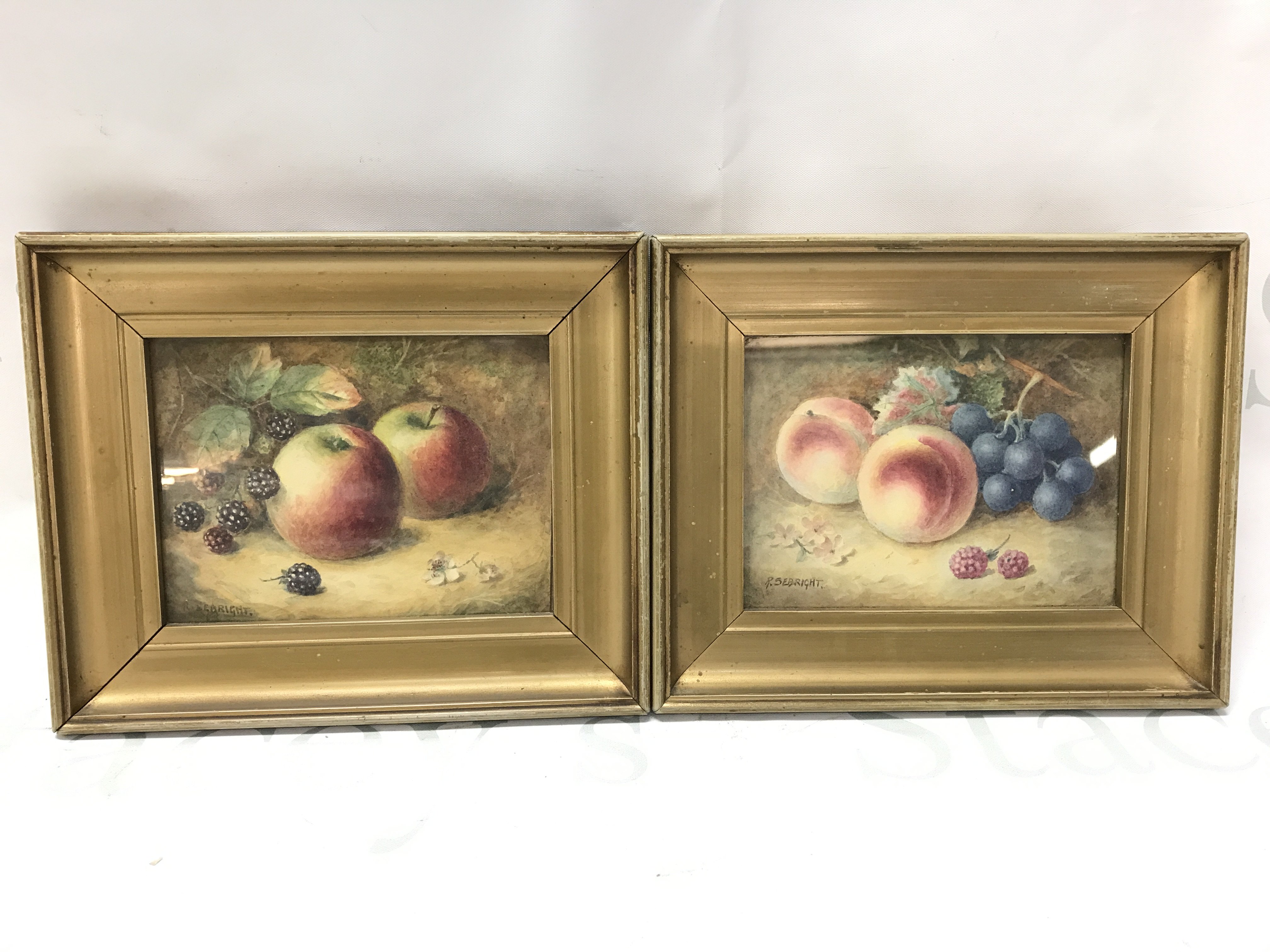 A pair of small still life gilt framed warercolours by Richard Sebright (1870-1951) . Frame dimensions 22x18cm. This lot cannot be posted