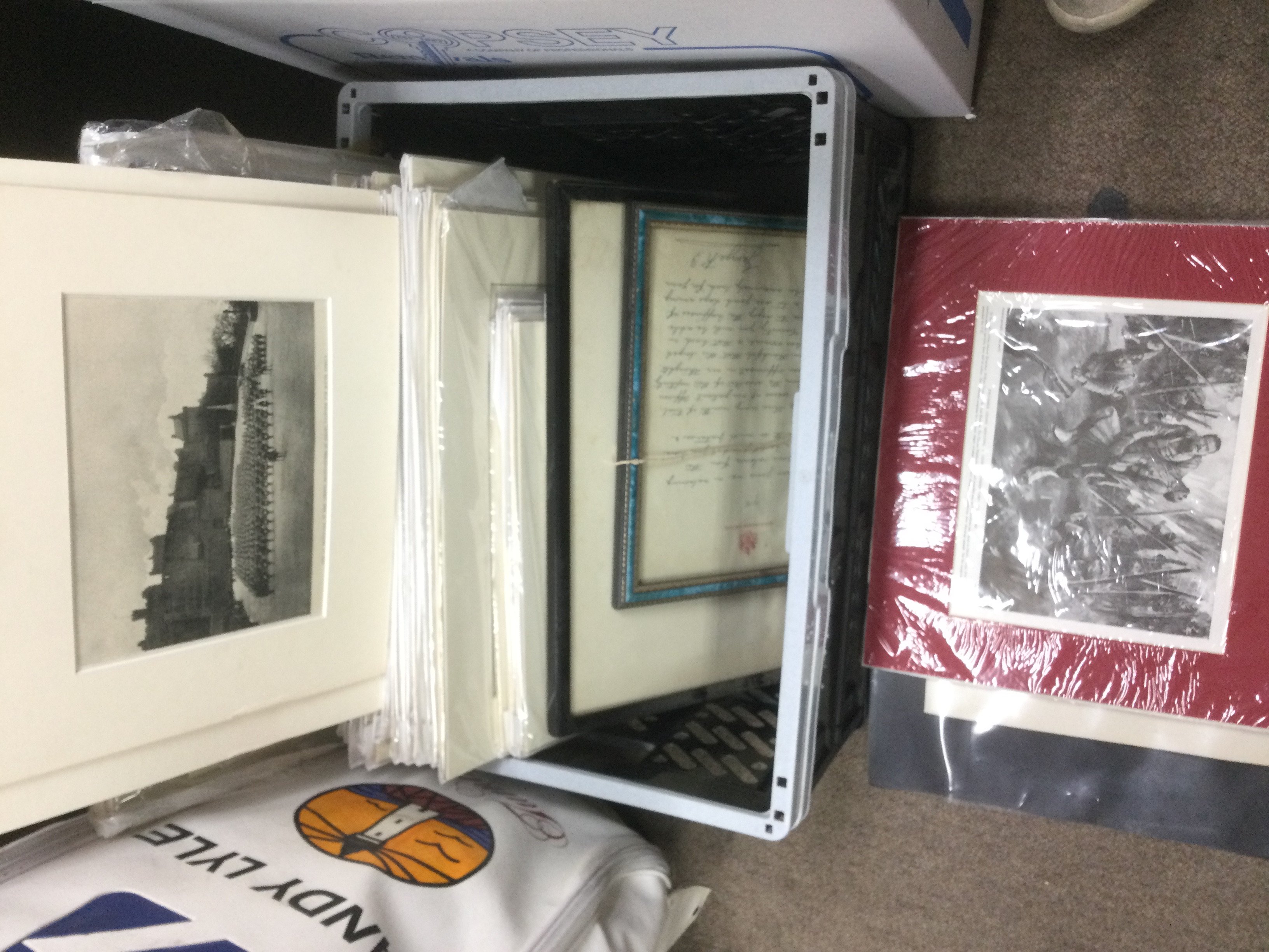 A box of prints and pictures including some of military interest. Shipping category D.