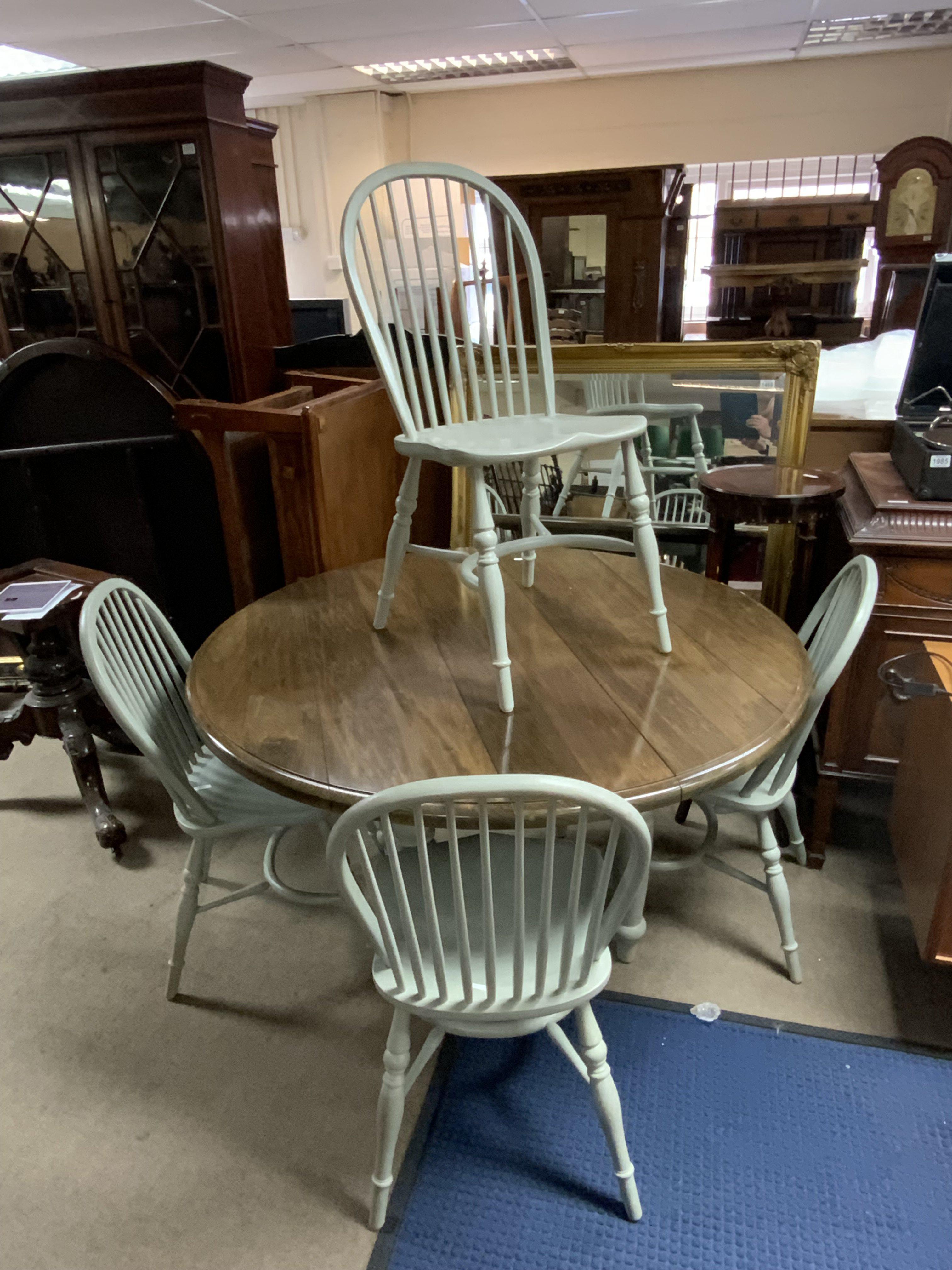 A Modern Chalon kitchen table with 4 stick back chairs. 131cm.