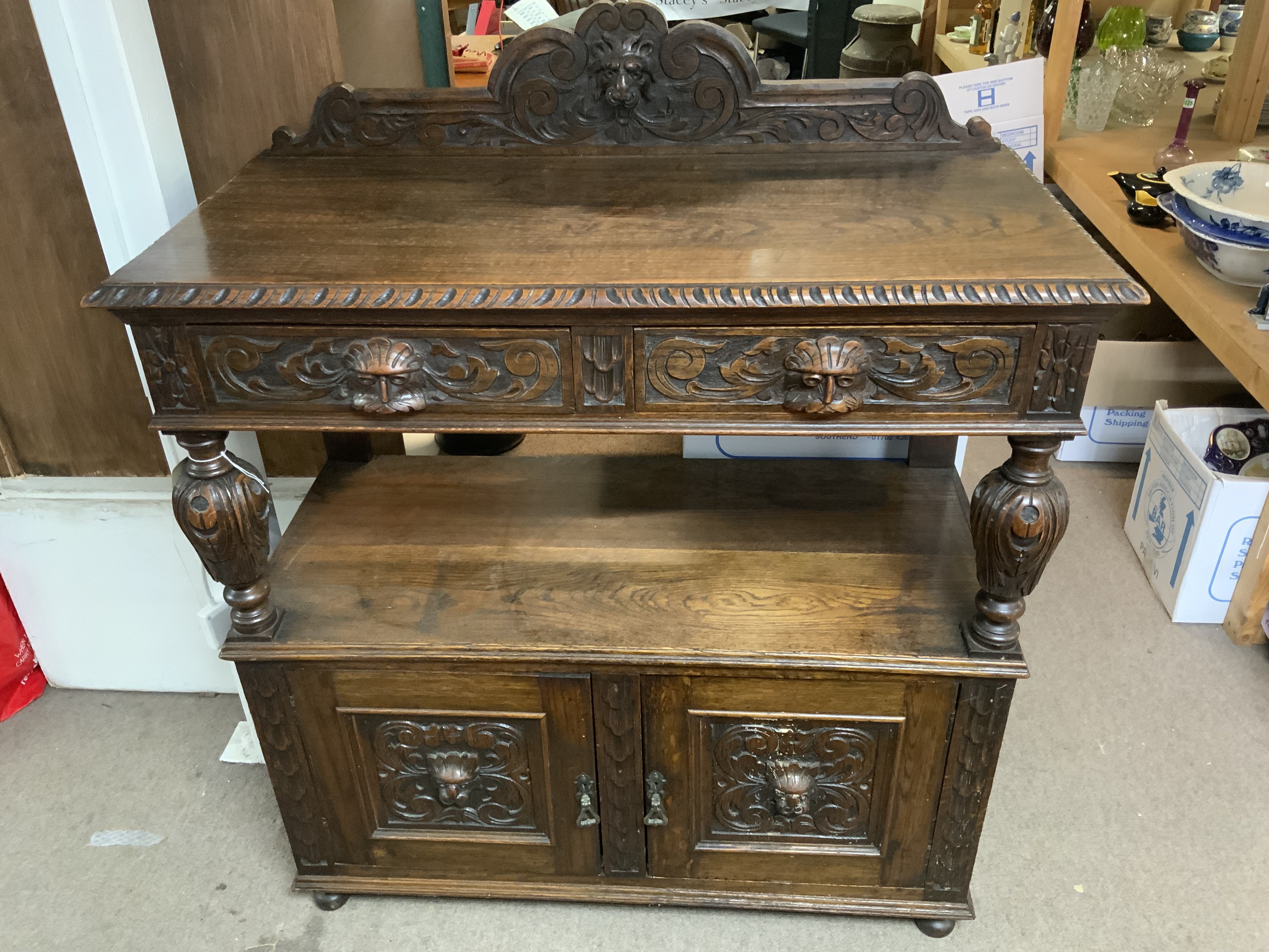 A 1930s oak carved Buffett. 106cm x 51cm x 126cm (No Reserve).