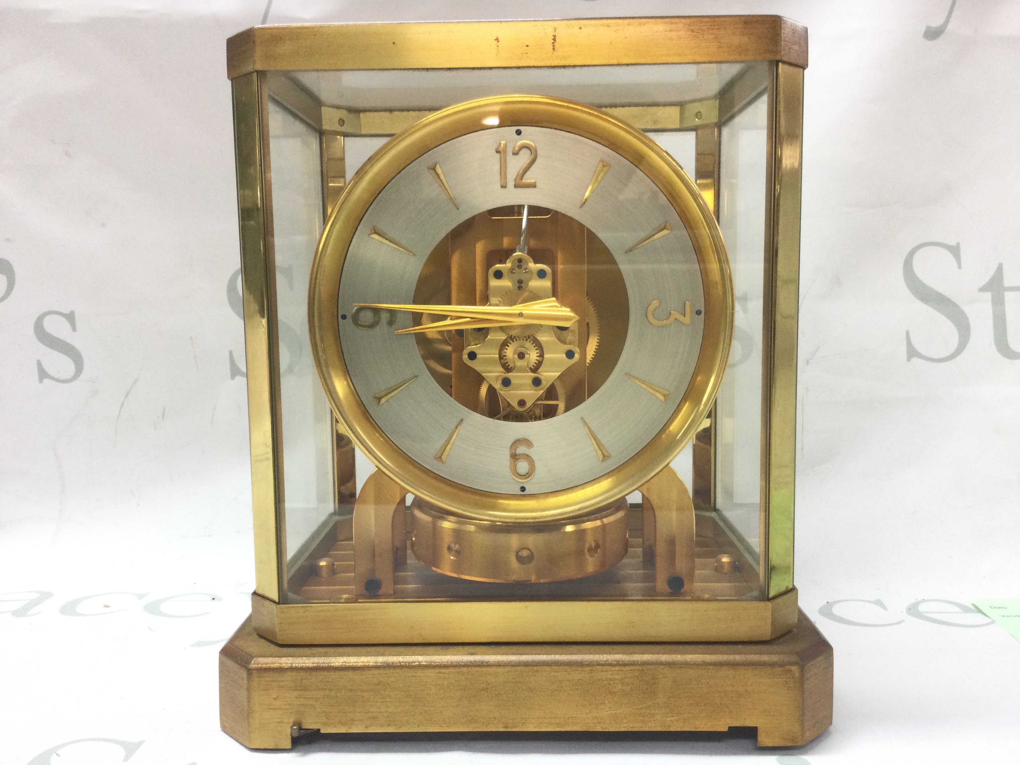 A Jager Le Coultre Atmos mantle Clock, gilt brass and glass cased. Dimensions 16x21x24cm .Seen working. This lot cannot be posted