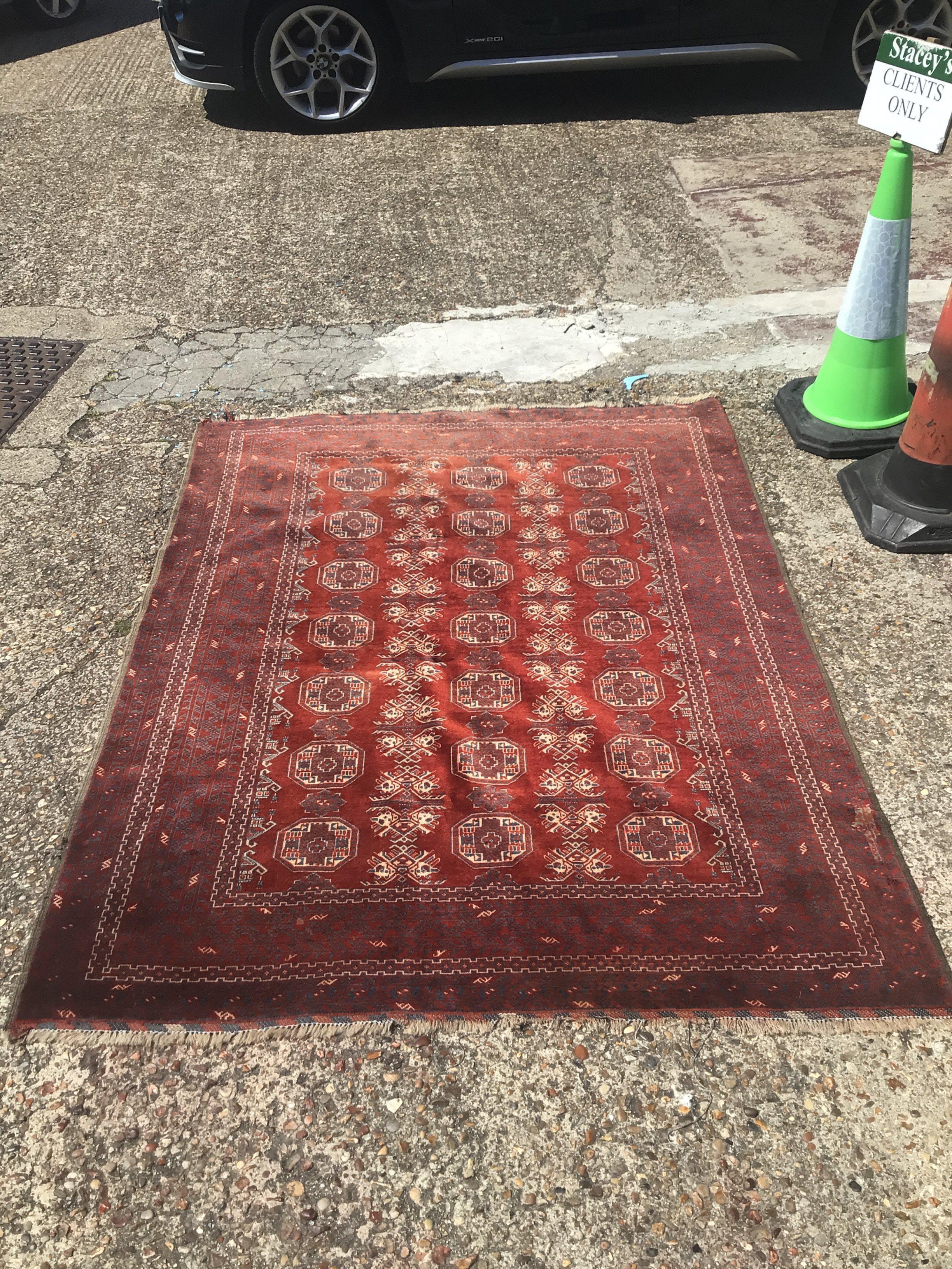 An Afghan/ tribal rug 148cm wide , 202cm long- NO RESERVE