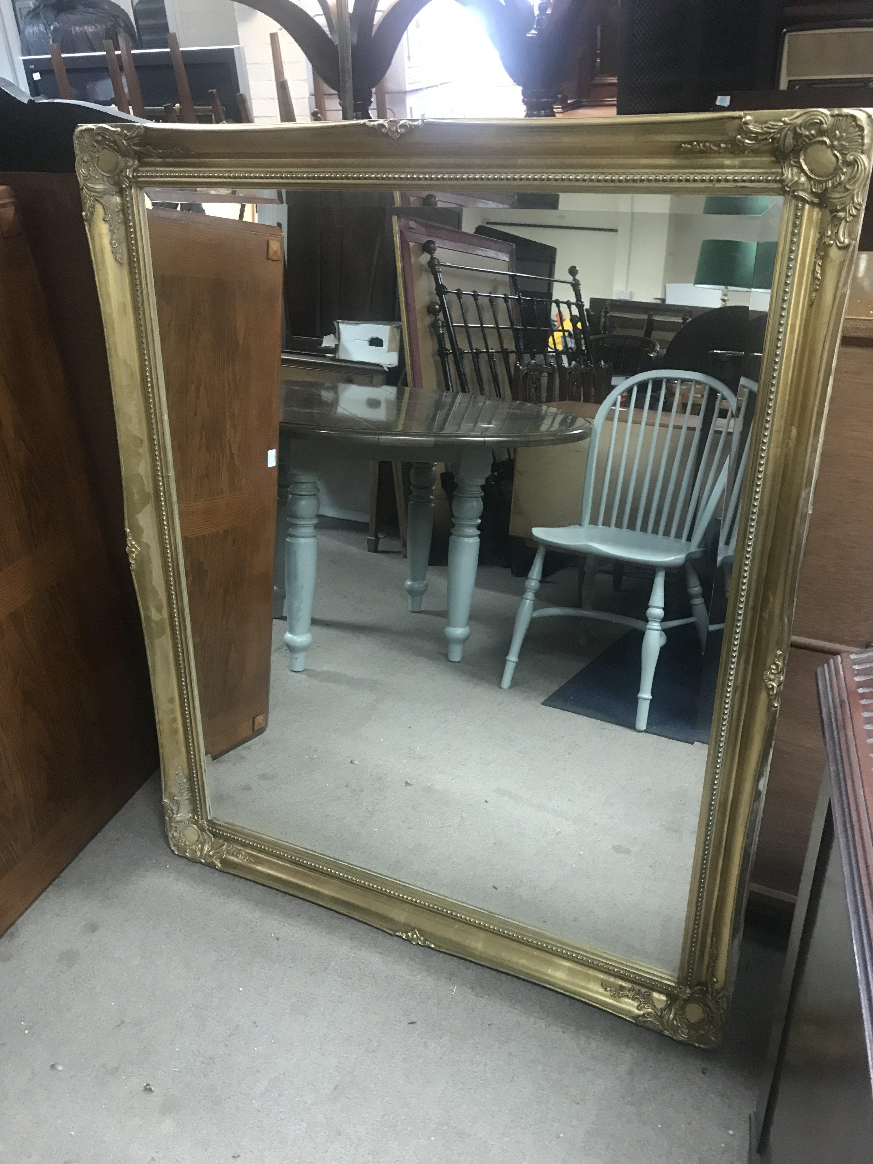 A large gilt mirror, Dimensions 106x130cm no reserve