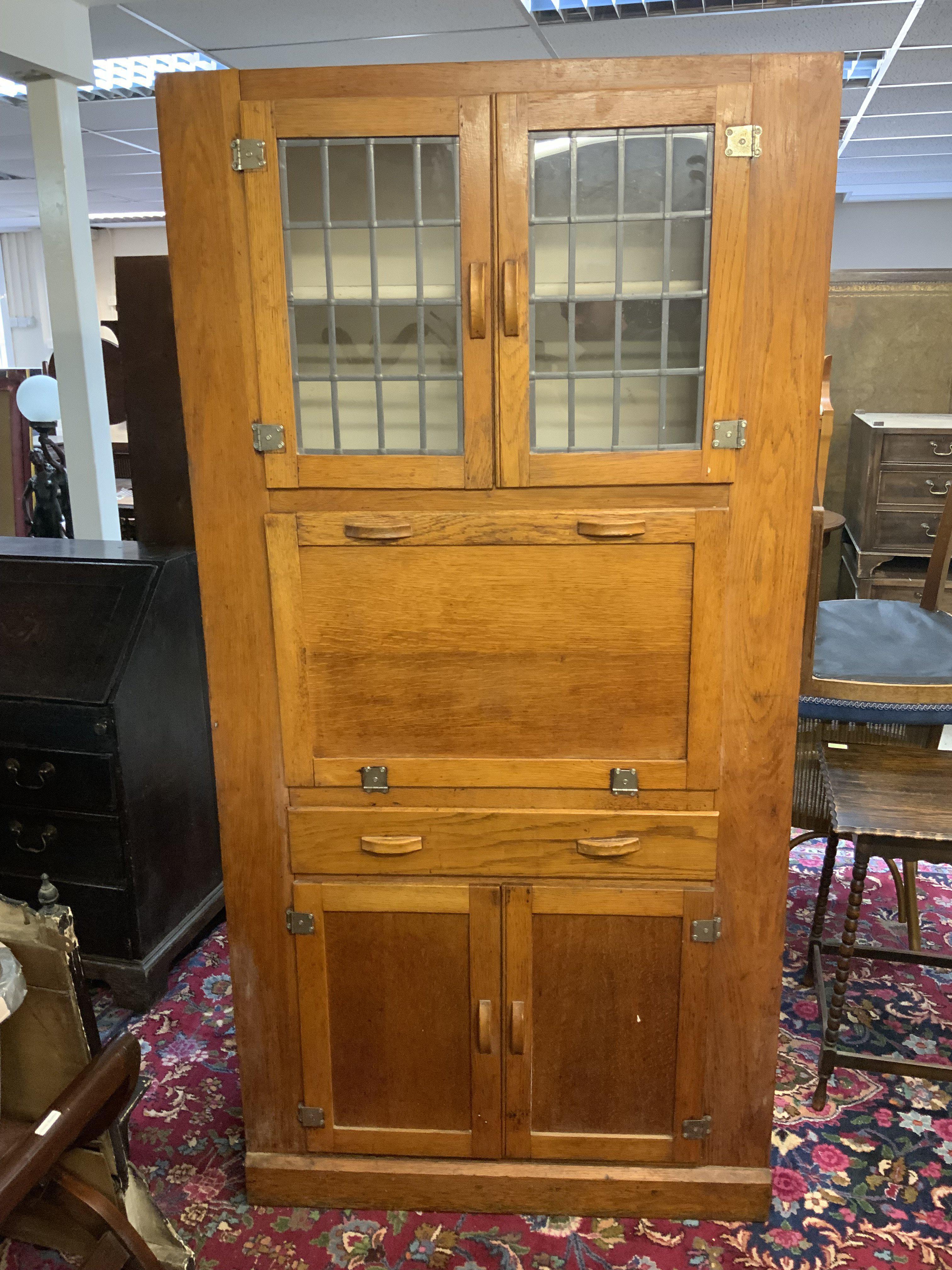 Two 1950s plywood Kitchen utility cabinets.