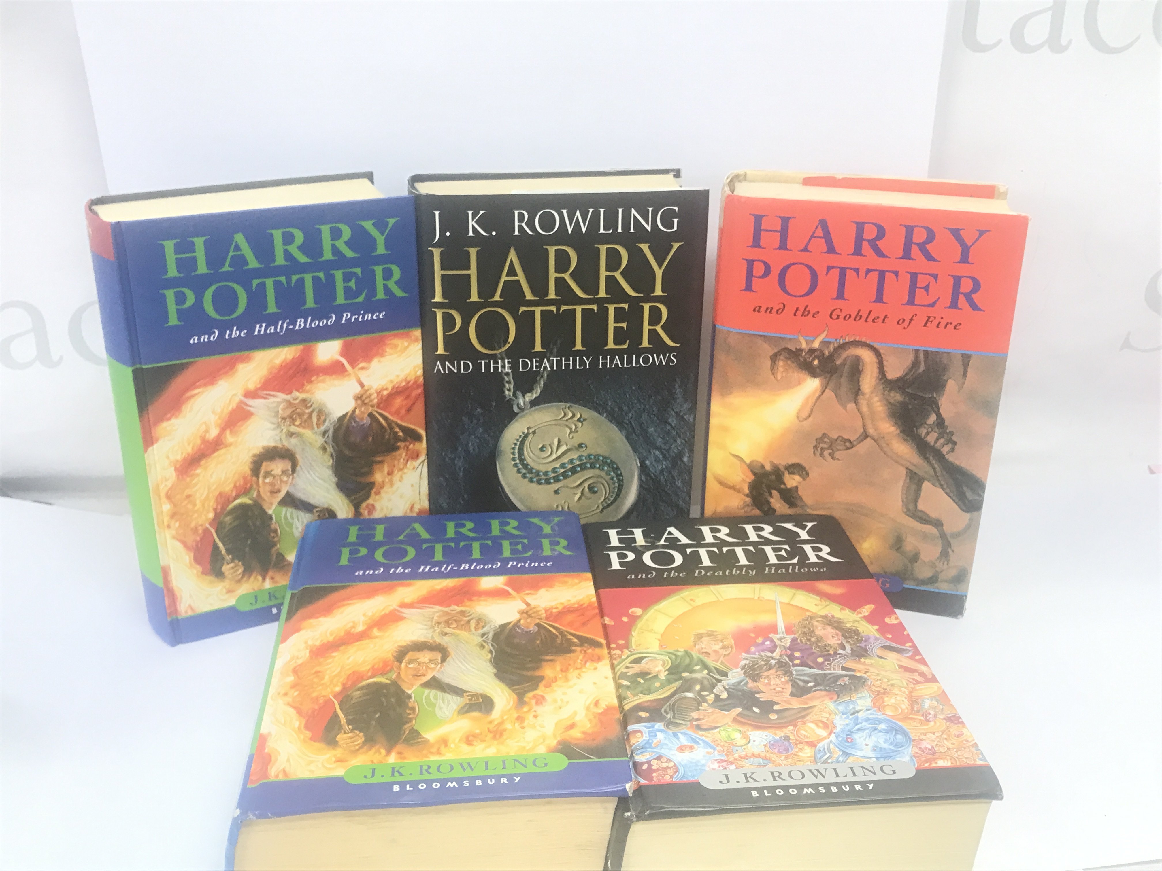 A collection of Harry Potter books some first edition
