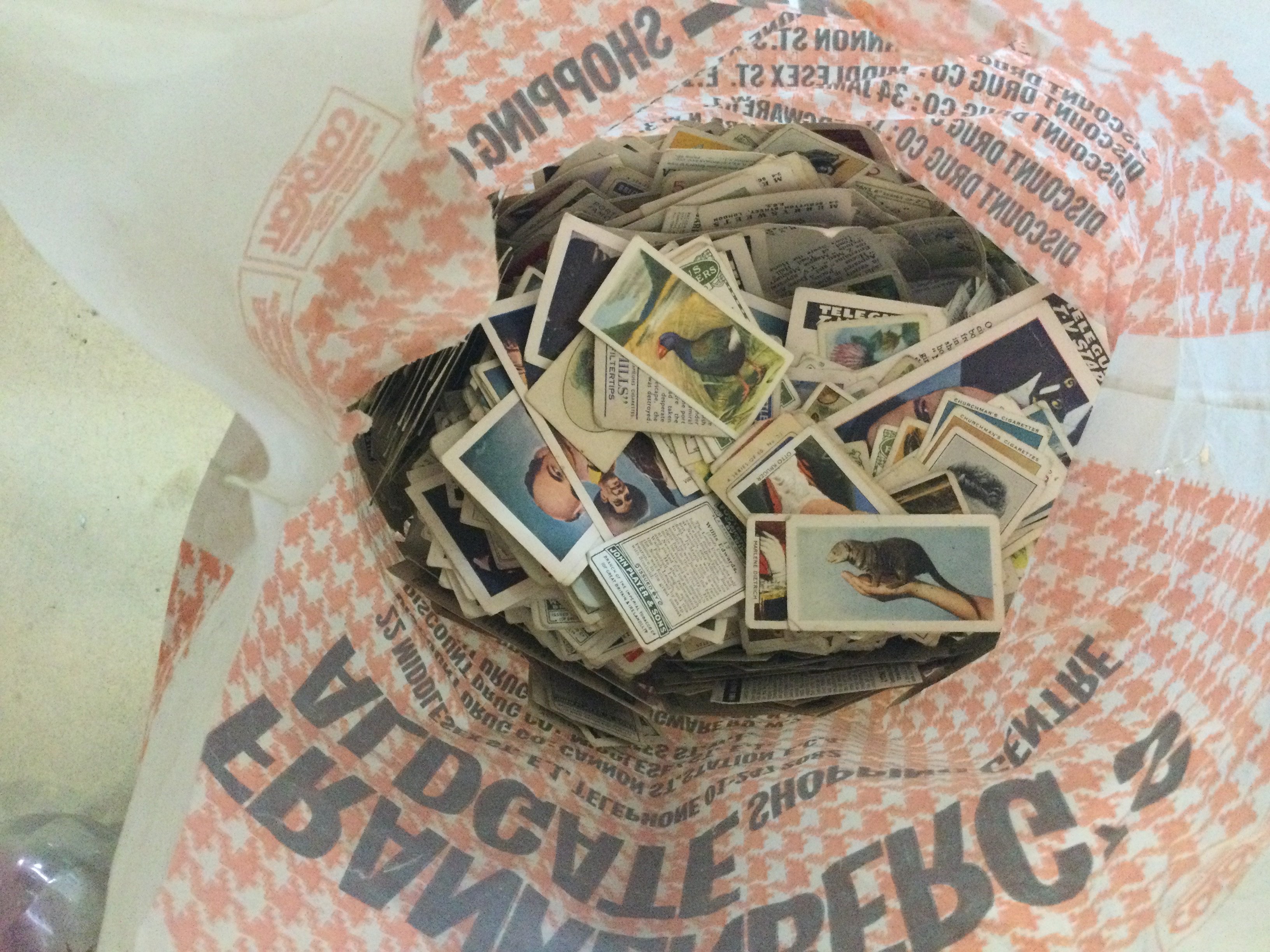A bag containing cigarette ads various.
