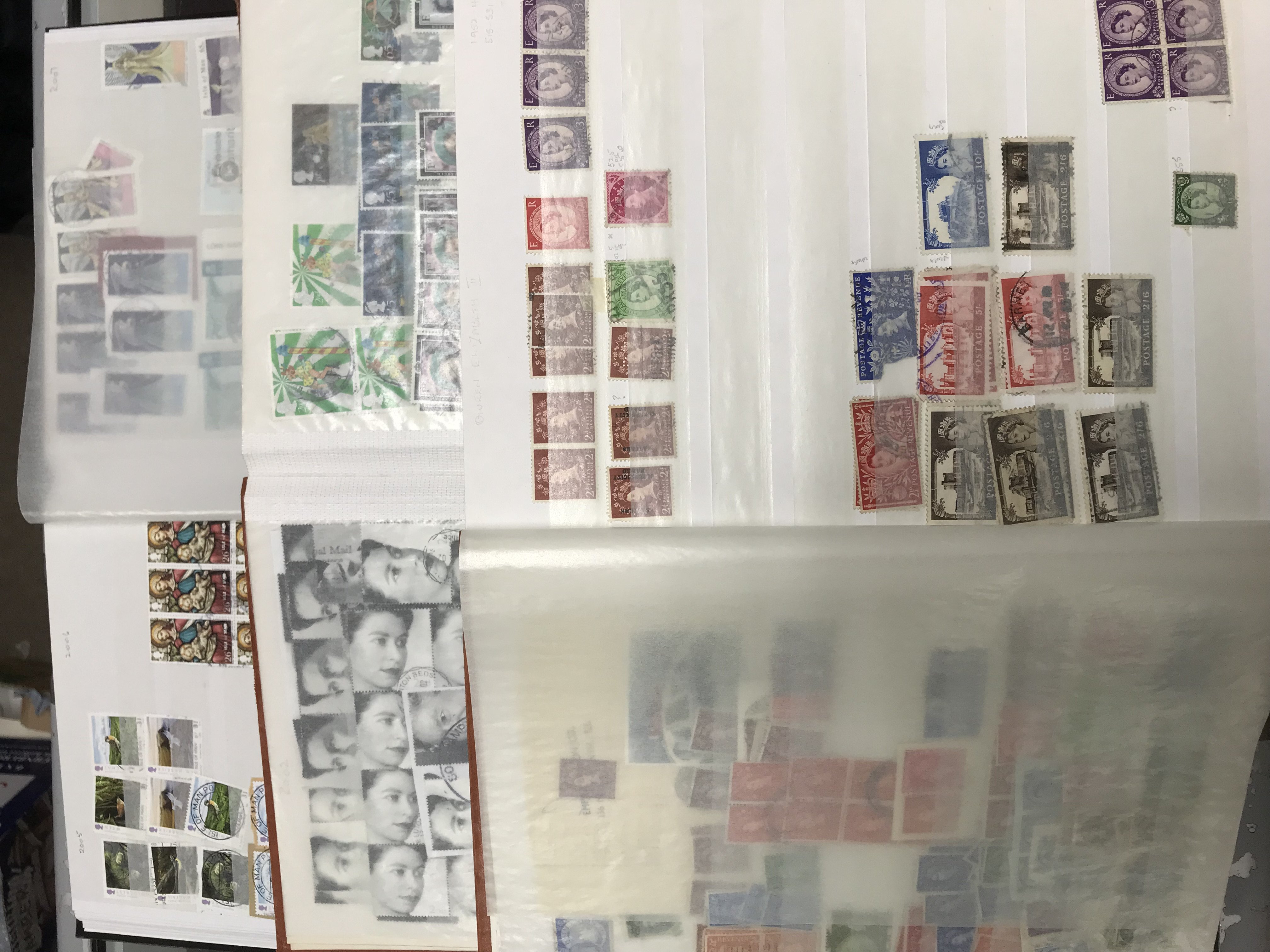 10 albums of British, commonwealth and world stamps.