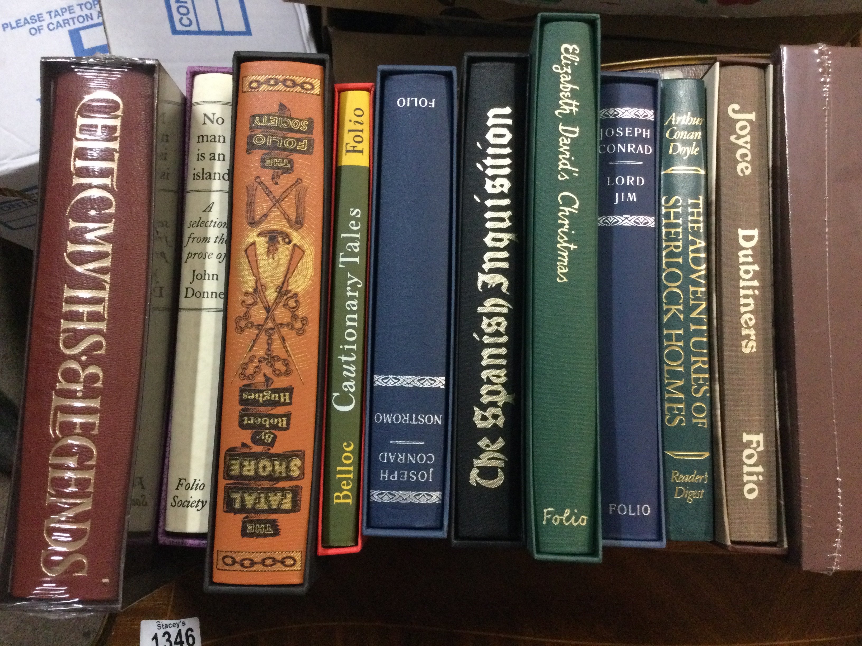 A collection of books including Folio Society.