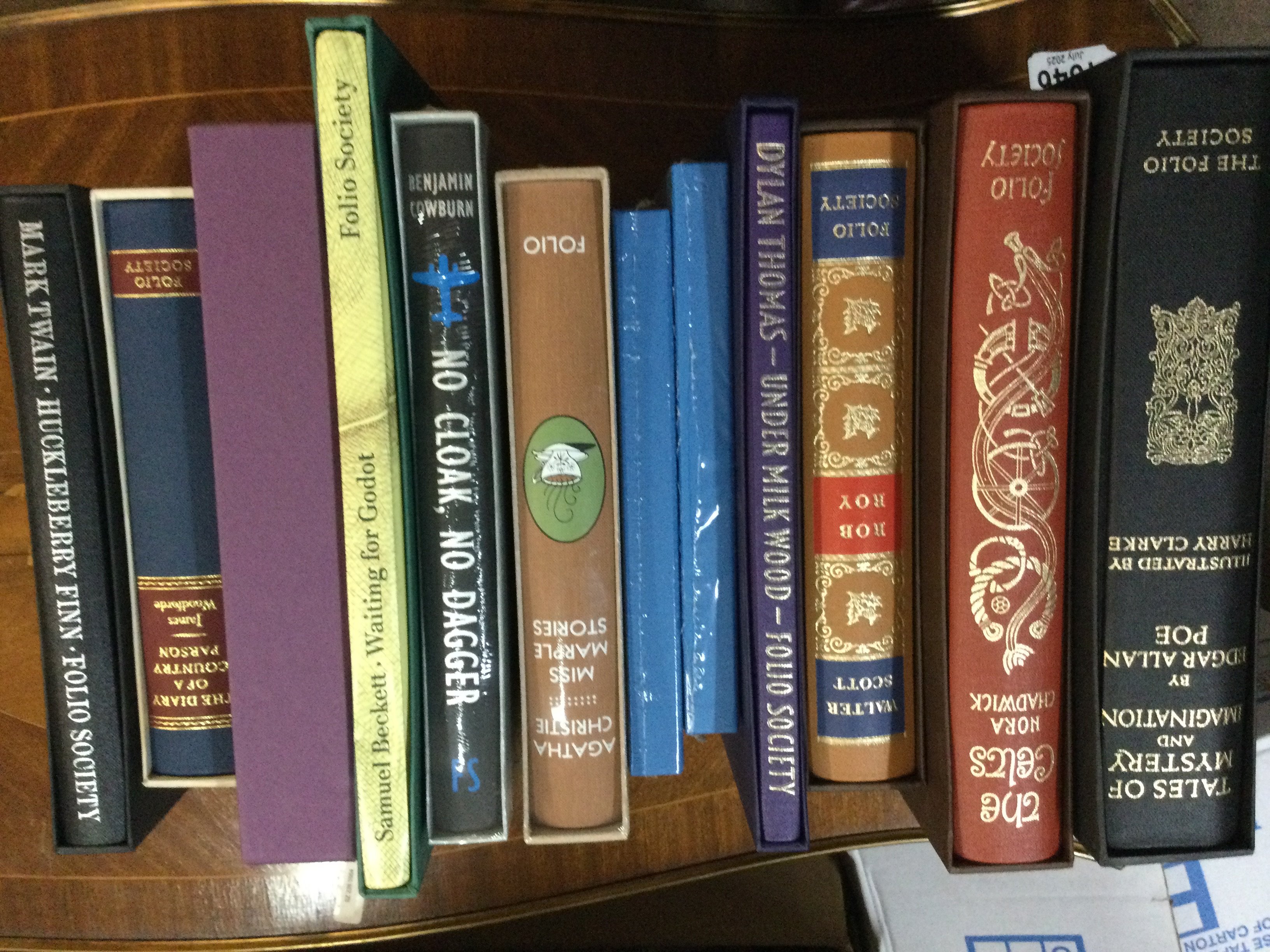 A collection of books including Folio Society.