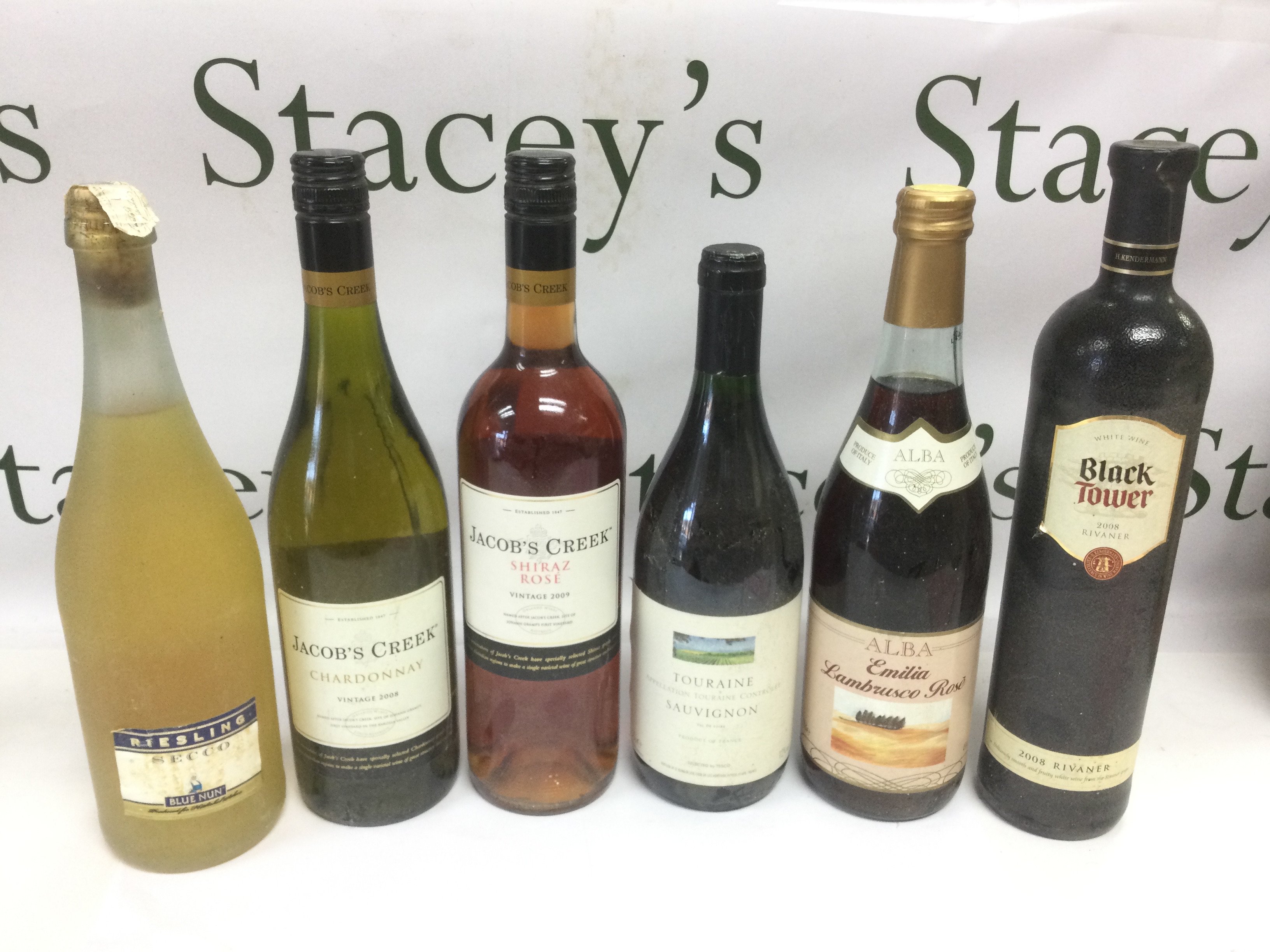 Eleven bottles of wine and spirits. Shipping category D.