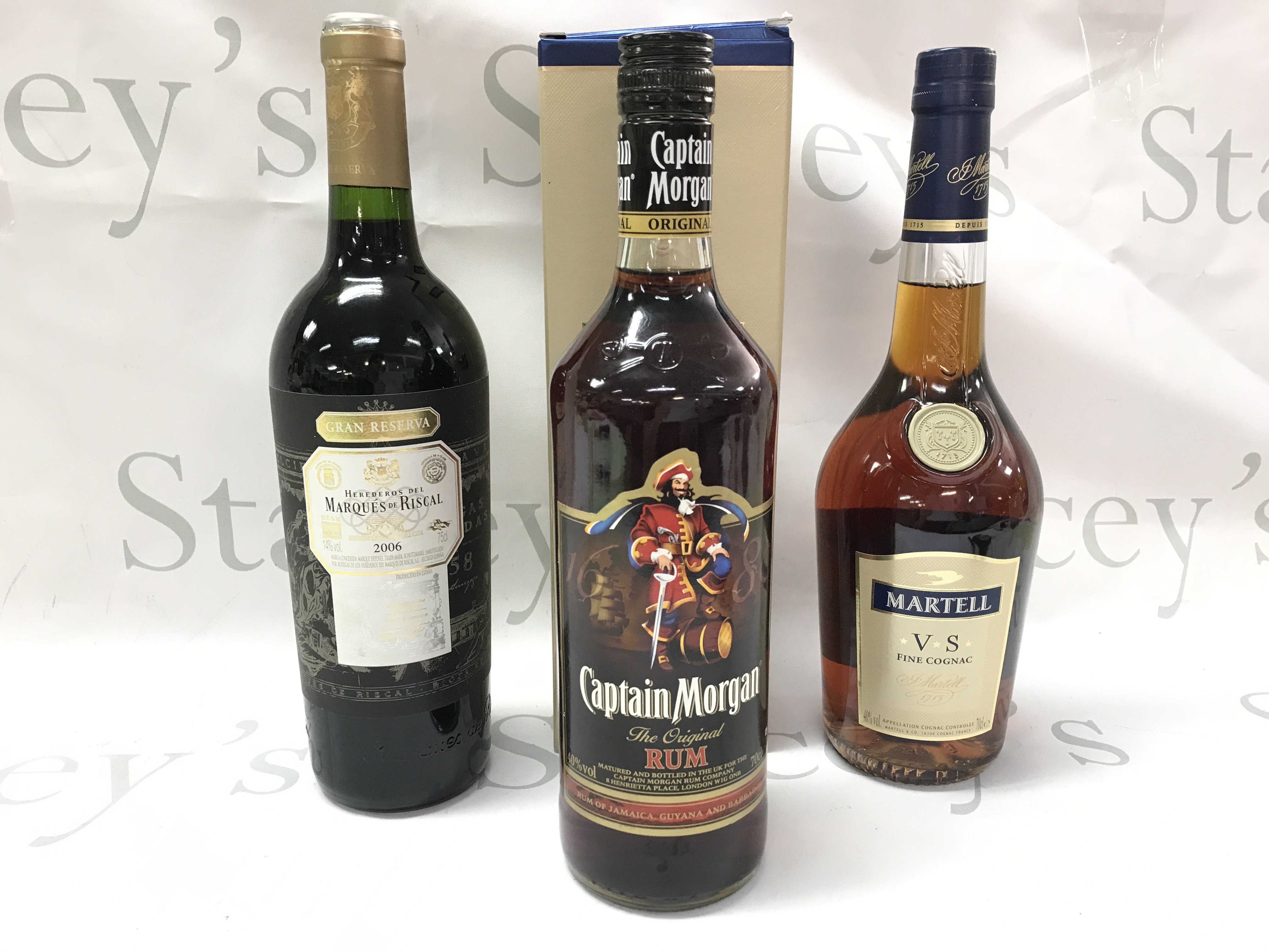Captain Morgans rum, 2006 Maques De Riscal , Martel VS fine Cognac