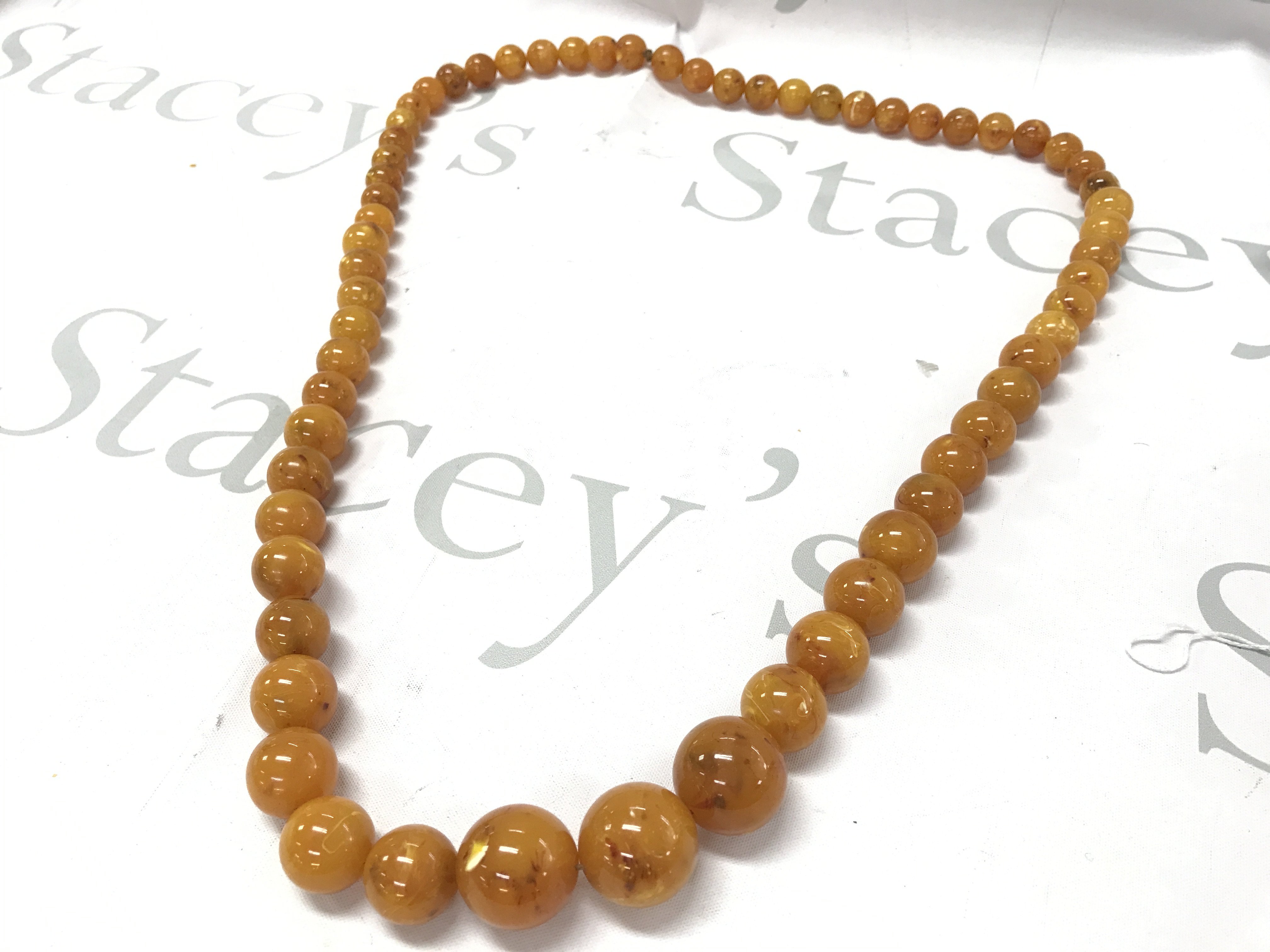 Extra large butterscotch amber necklace 175g 100cm. Postage category A